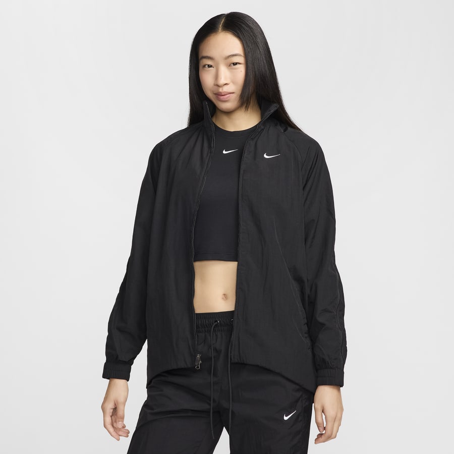 レディースNIKEウインドブレーカーフード付き - メルカリ
