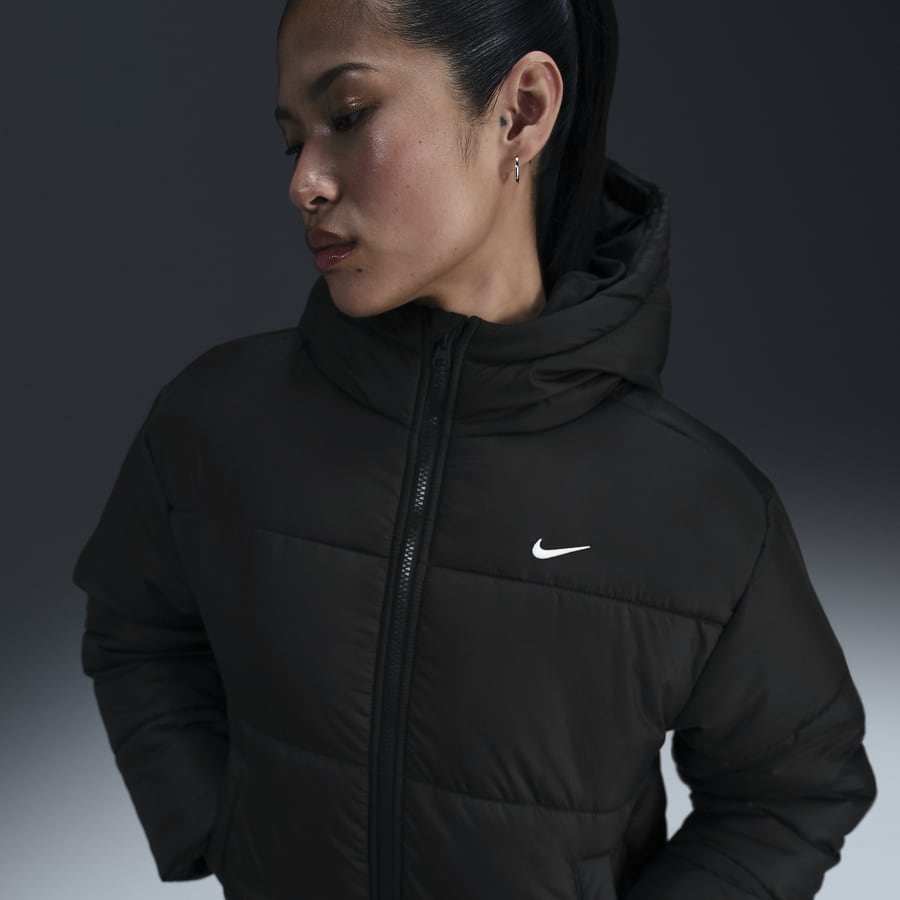 レディースNIKEウインドブレーカーフード付き - メルカリ