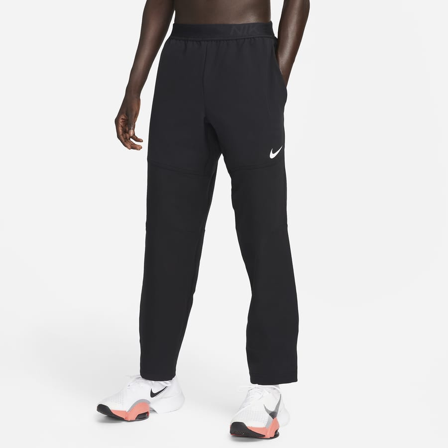 Nike track pants top with zipper pockets