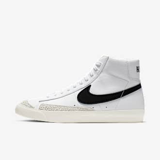 White nike shoes 2025 with black logo