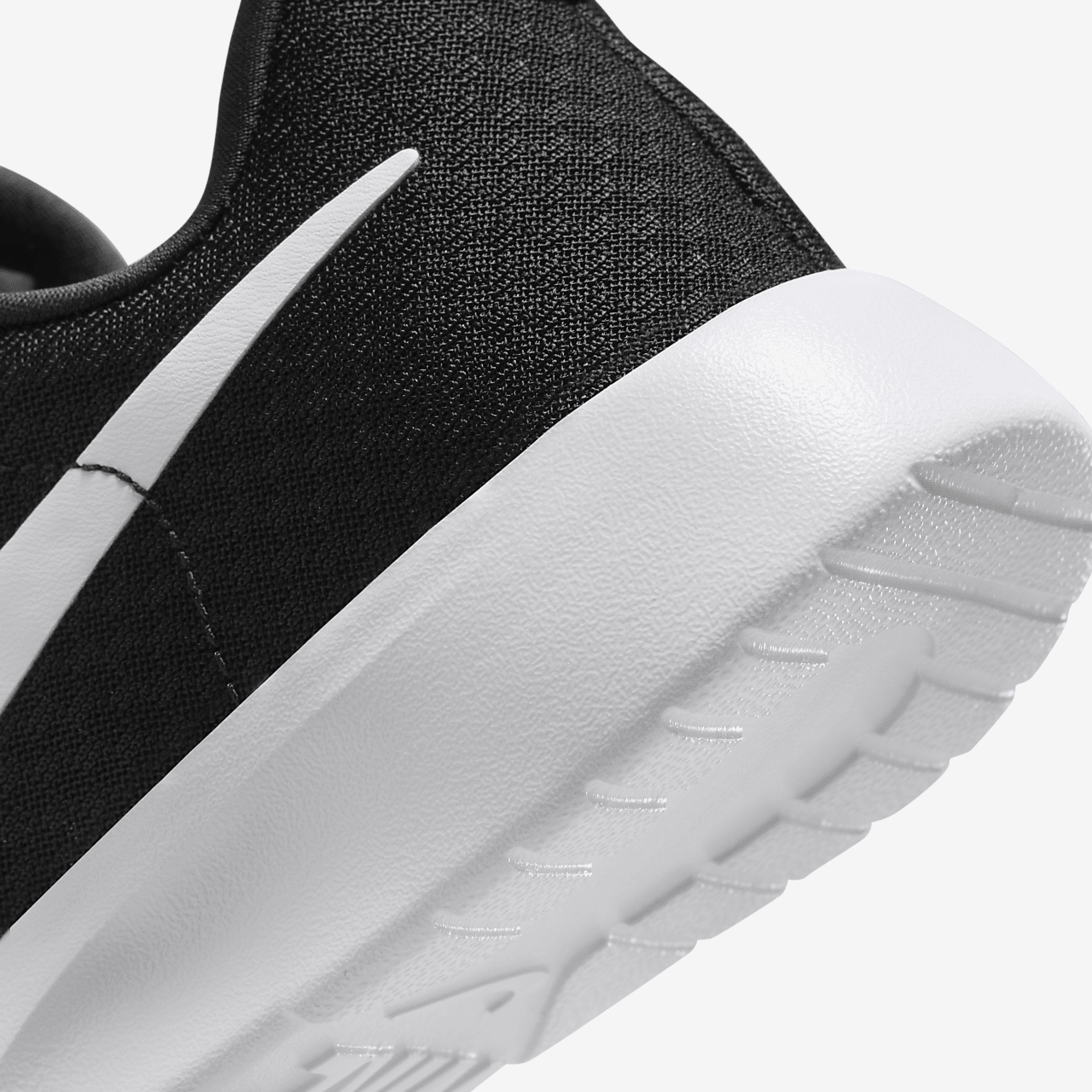 Nike Tanjun sneaker Zwart/Wit/Wit