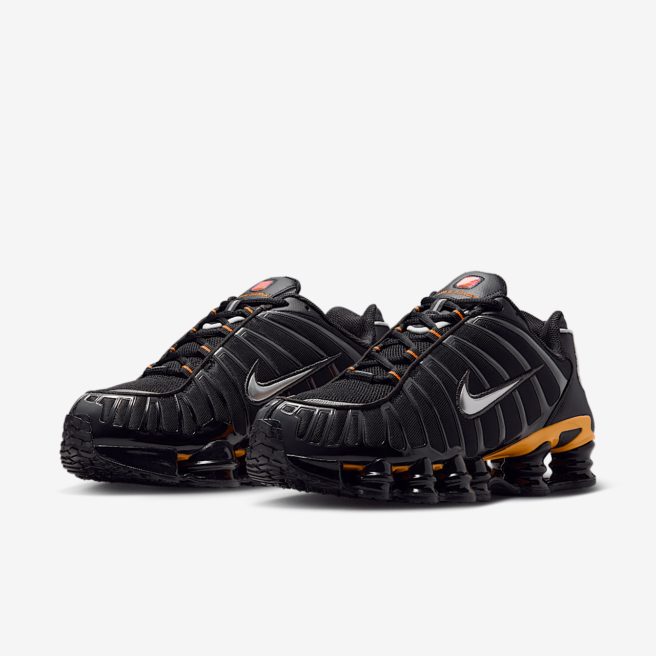 Nike Nike Shox sneaker Zwart/Varsity Maize/Playful Pink/Metallic Silver