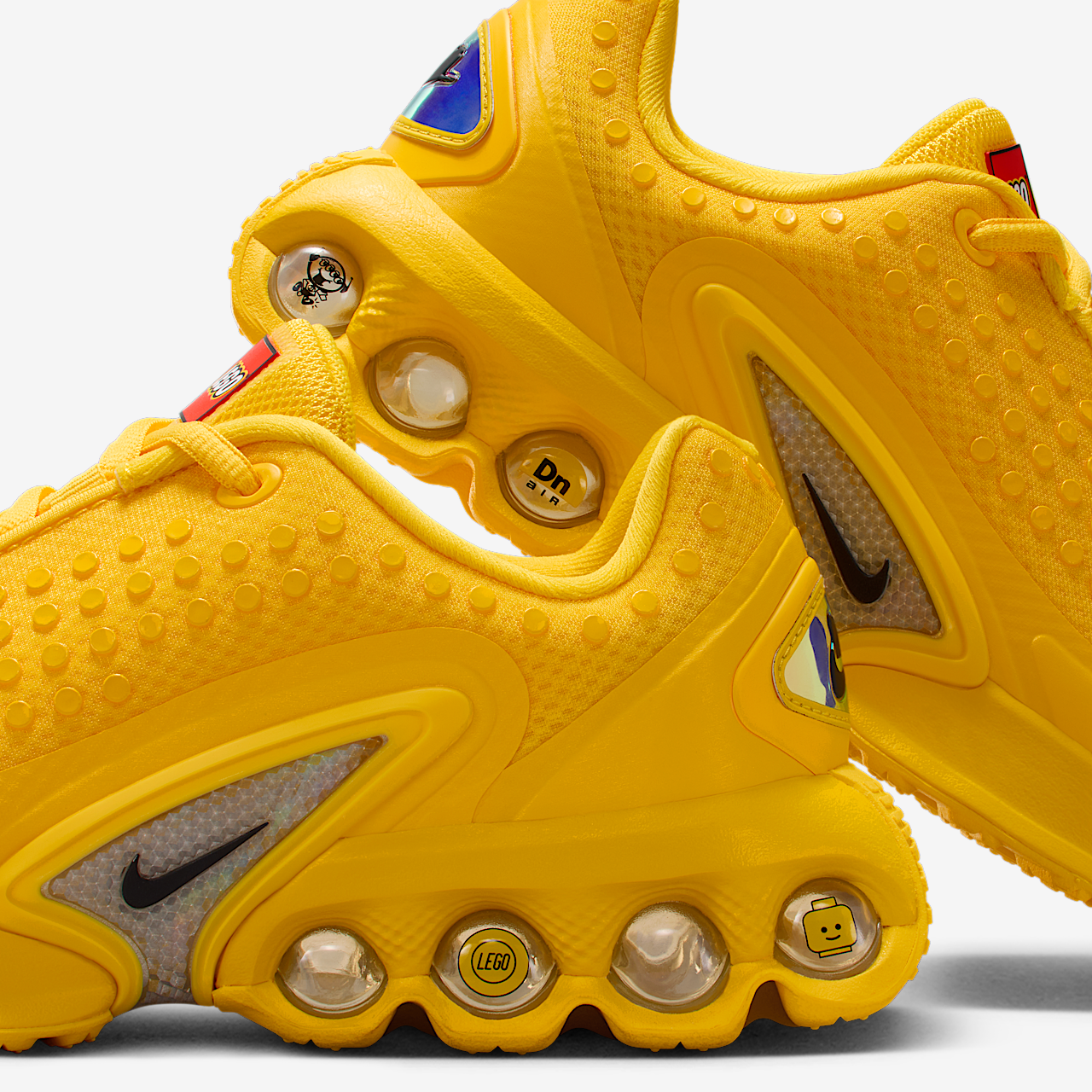 Nike Air Max DN sneaker Tour Yellow/Volt/Rush Red/Zwart