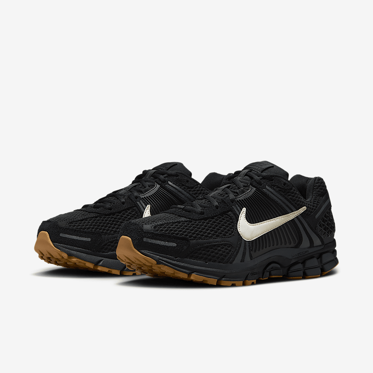 Nike Vomero sneaker Zwart/Off Noir/Flax/Coconut Milk