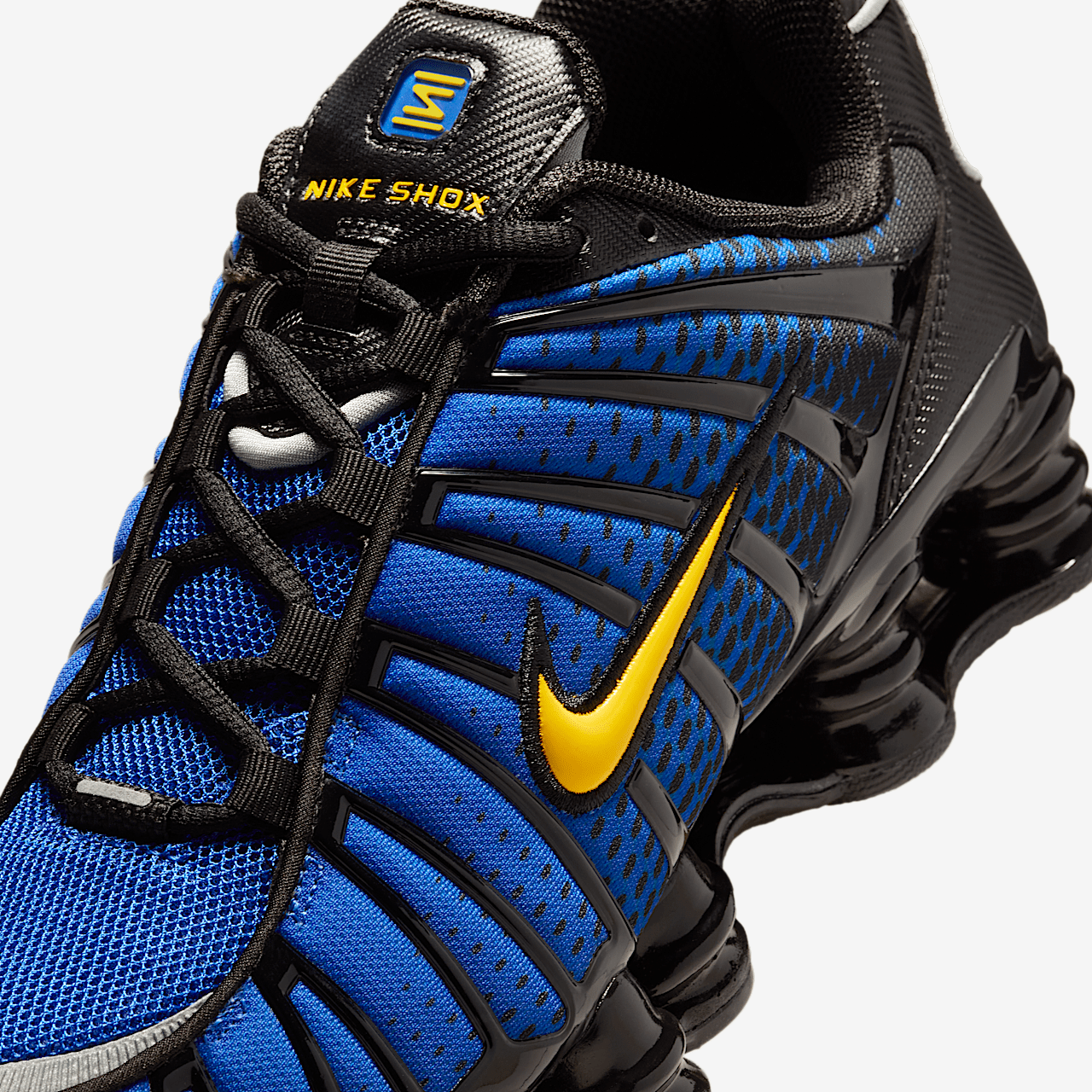 Nike Nike Shox sneaker Zwart/Metallic Silver/Lyon Blue/Varsity Maize