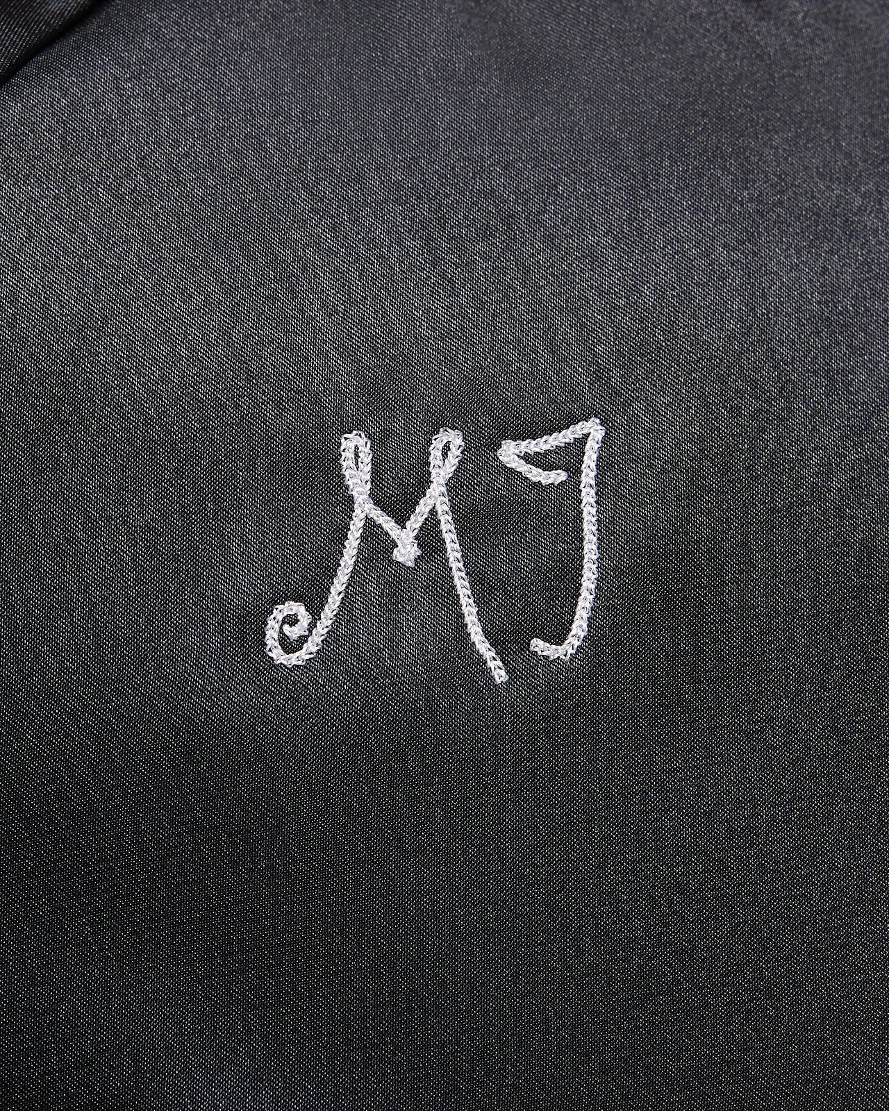 Black and white jordan varsity jacket store