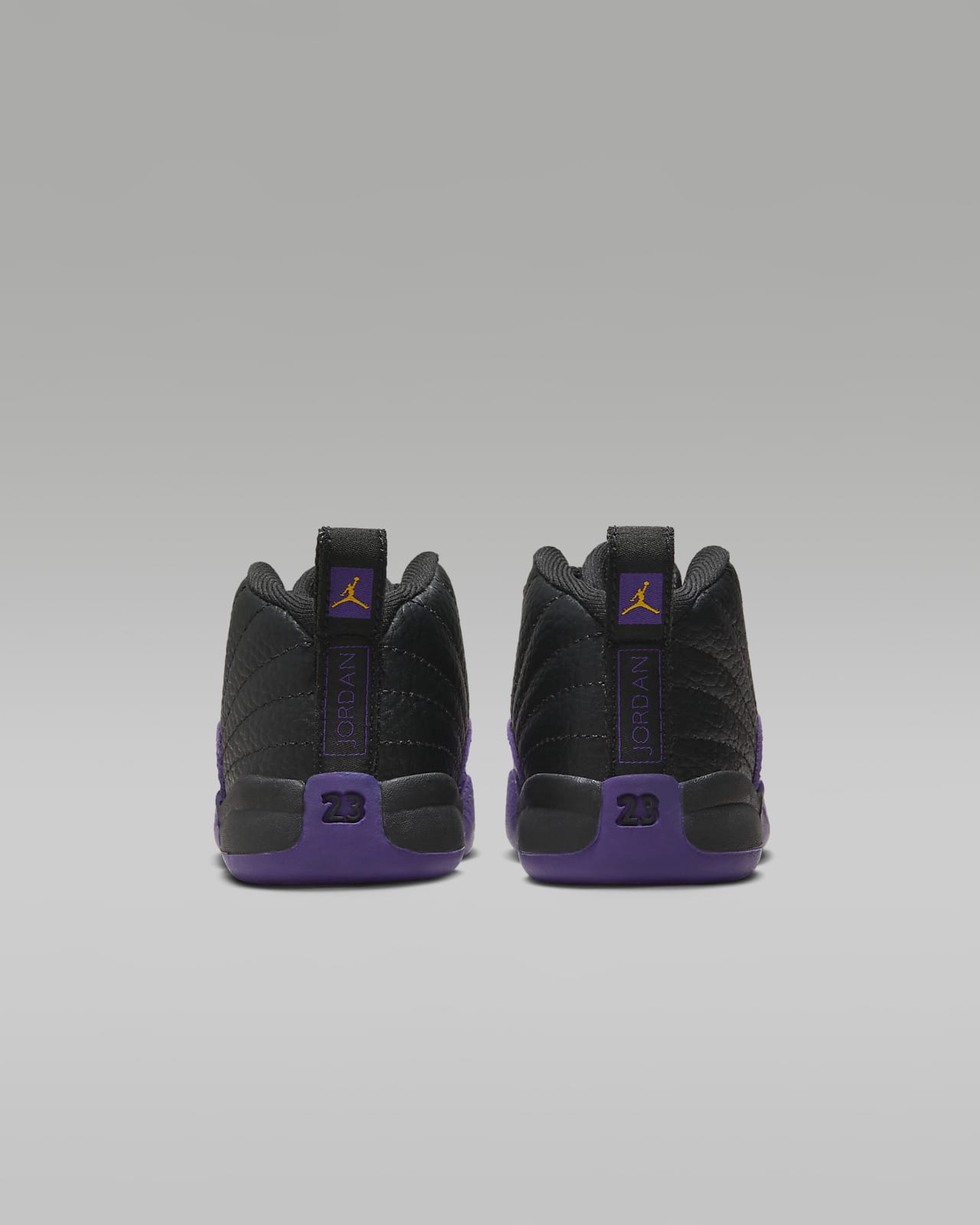 Jordan 12 Retro High-Top Sneakers in Black/Dark Concord