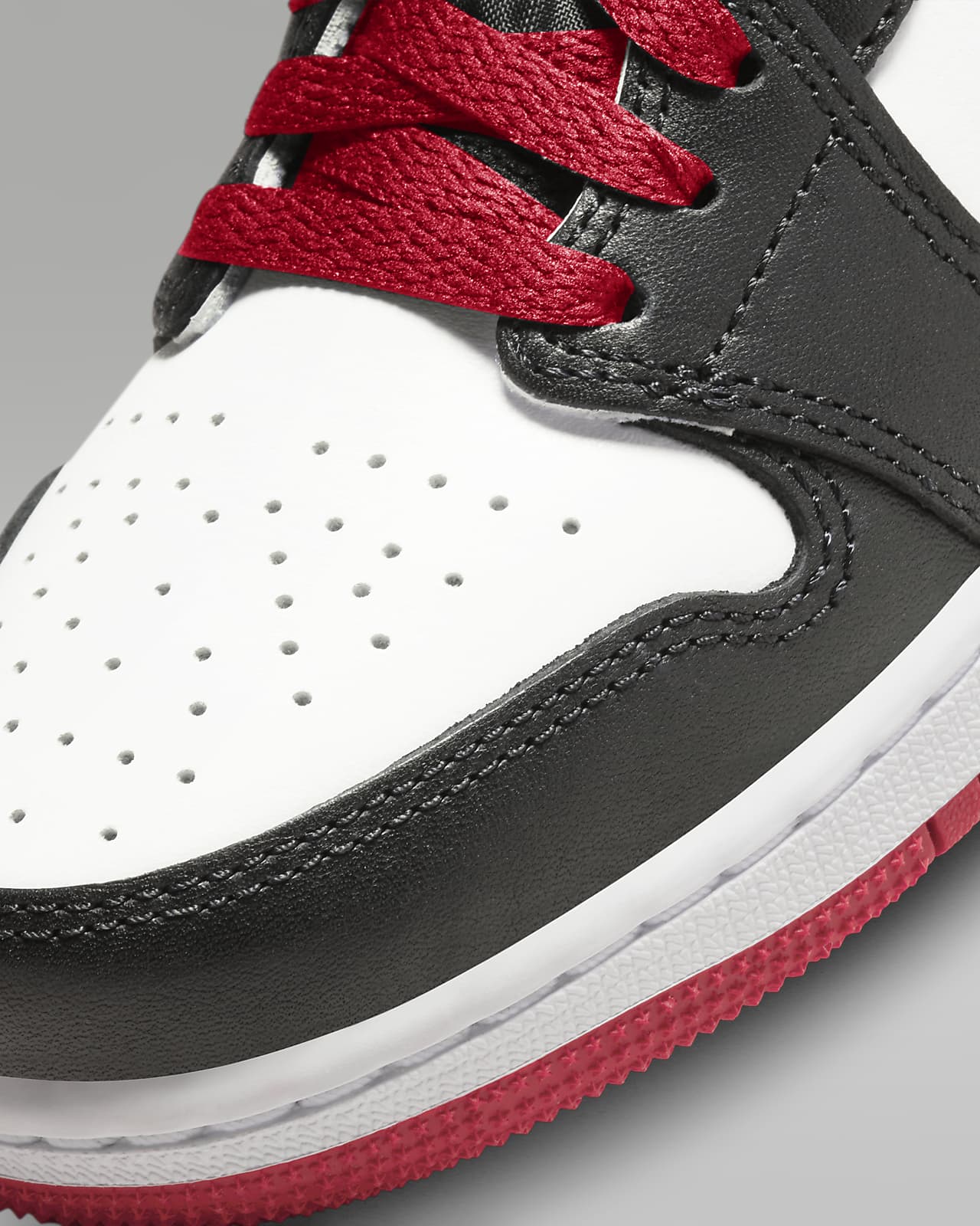 Air Jordan 1 Mid Big Kids' Shoes.