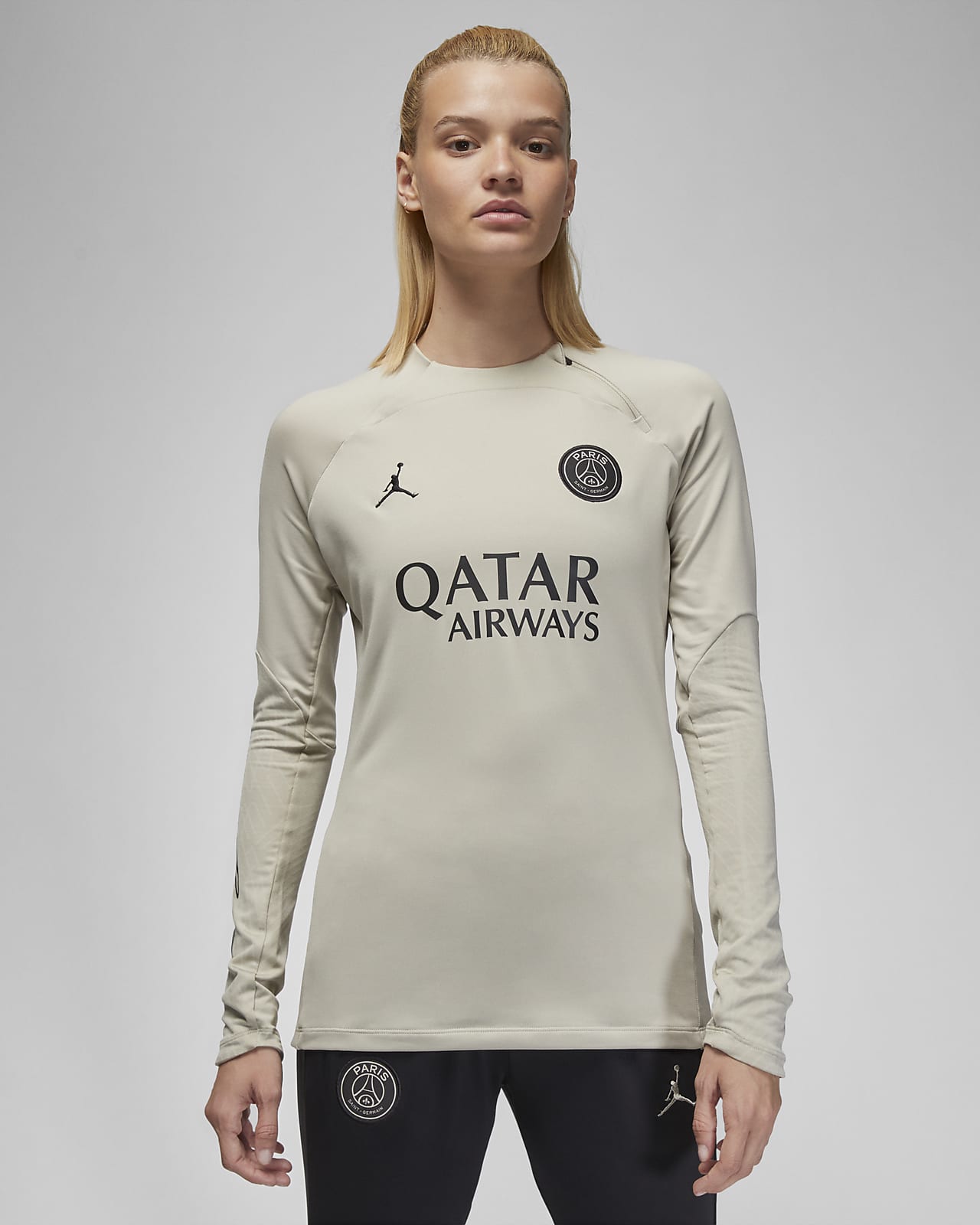 Camisola de treino de futebol de gola redonda Jordan Dri-FIT do terceiro equipamento Strike Paris Saint-Germain para mulher