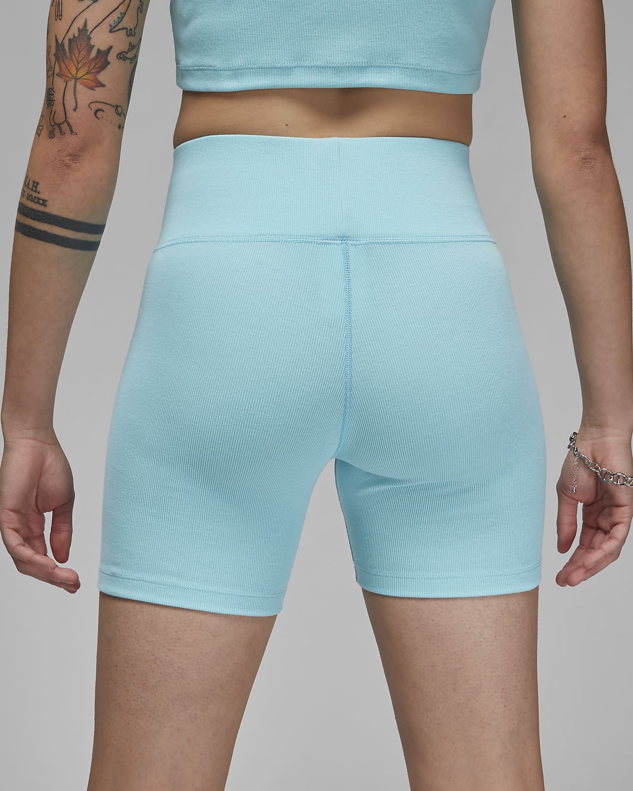 Teal bike shorts top