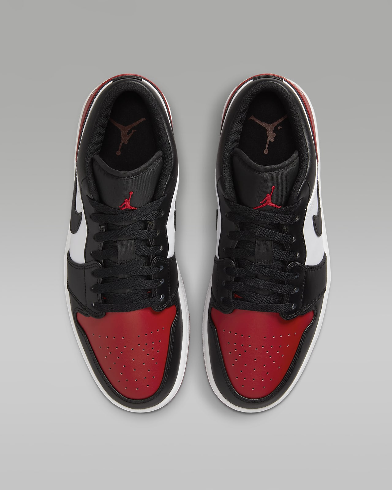 Nike Jordan Air 1 Low sneakers in black and red