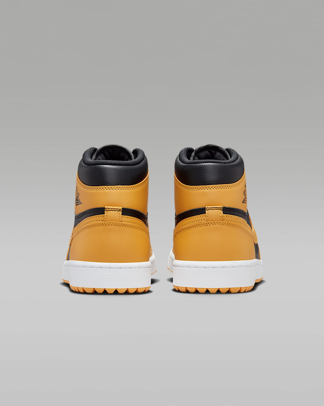 Gold nike top golf shoes