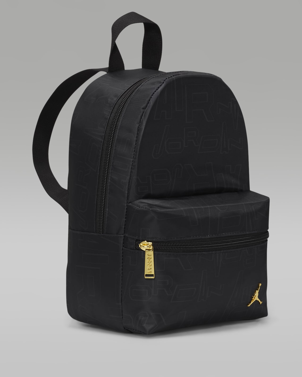 Mini backpack black and gold top