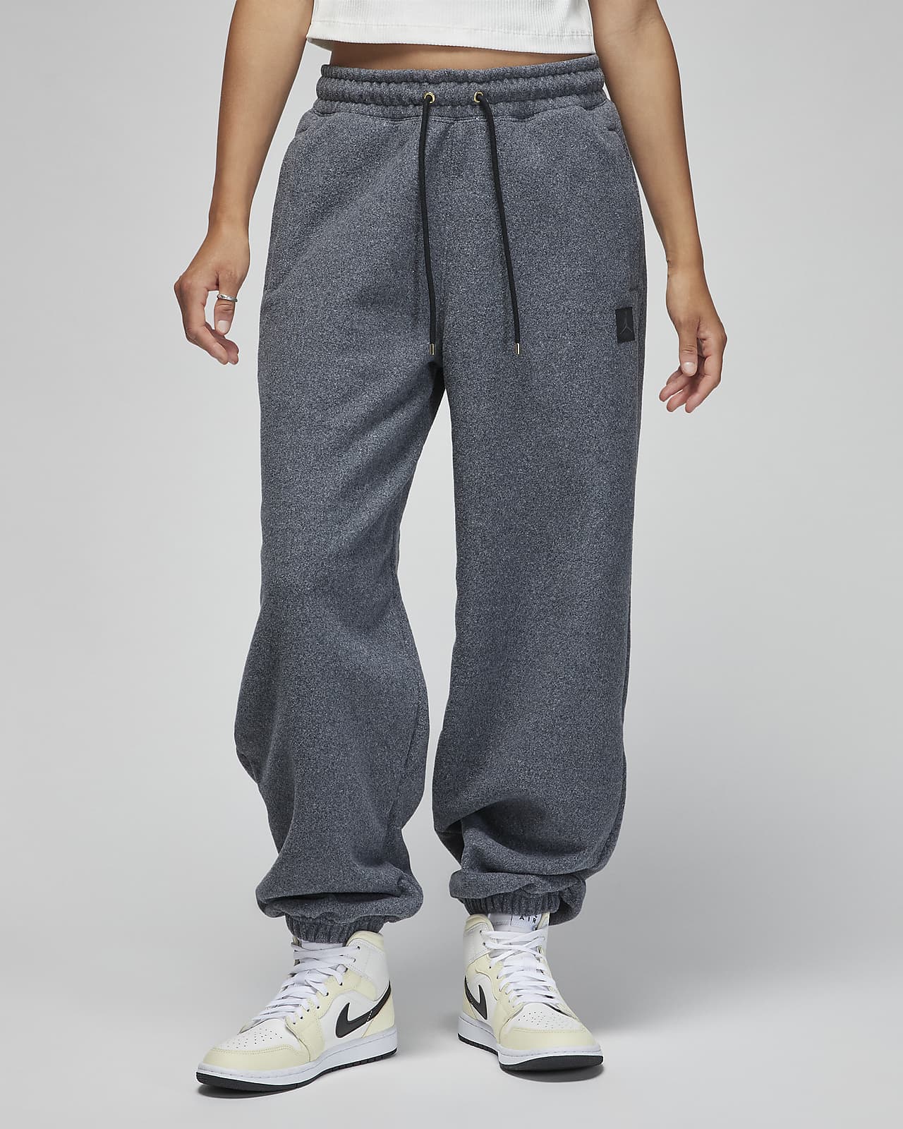 Buy Nike Women's Sportswear Essential Fleece Pants Grey in KSA -SSS