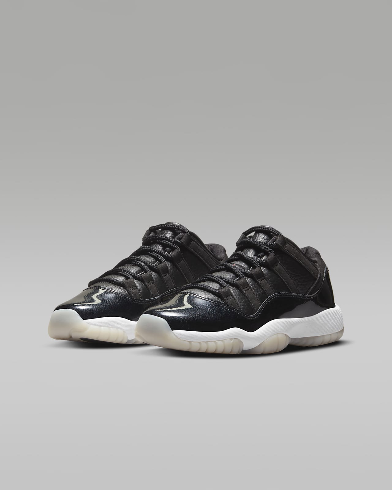 Air Jordan 11 Retro Low Older Kids' Shoes. Nike LU