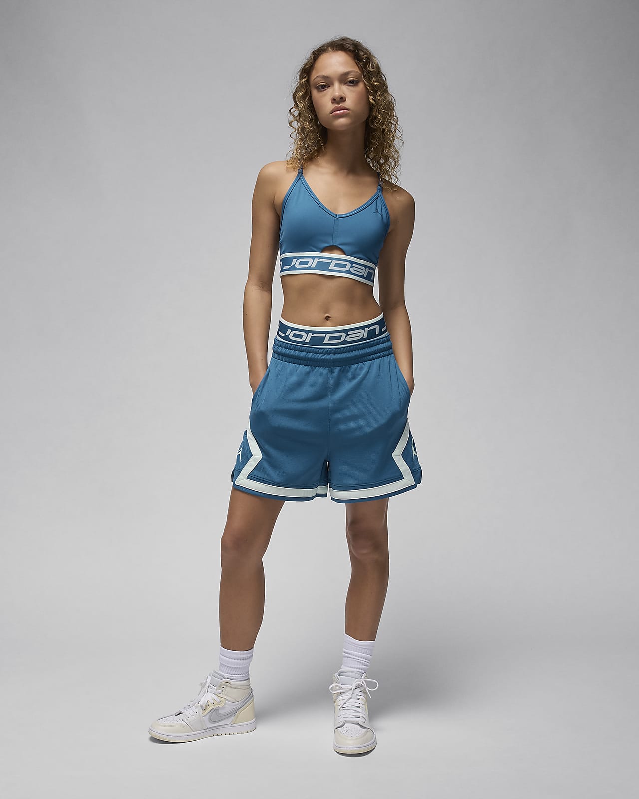 Nike Sisterhood Indy bra top in blue