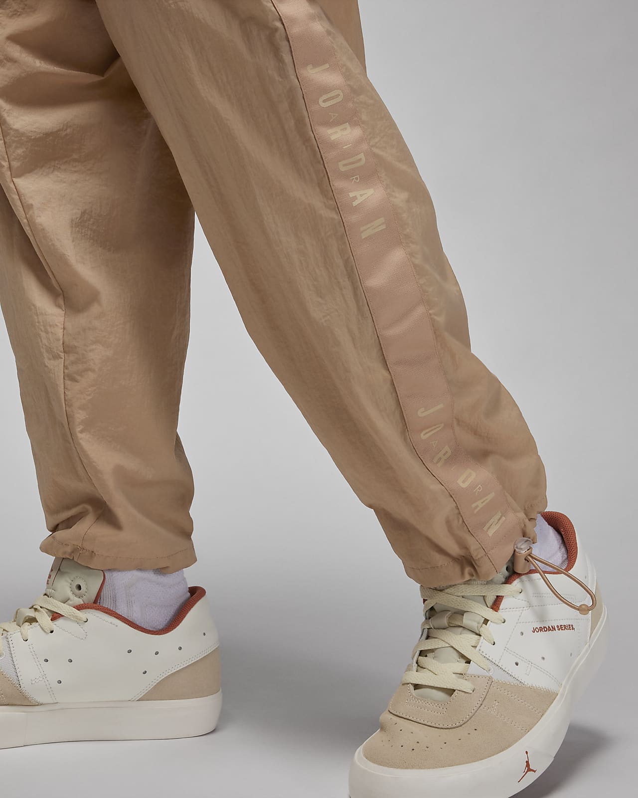 Nike x Drake NOCTA NRG Men's Woven Track Pants Beige FN7668-200| Buy Online  at FOOTDISTRICT