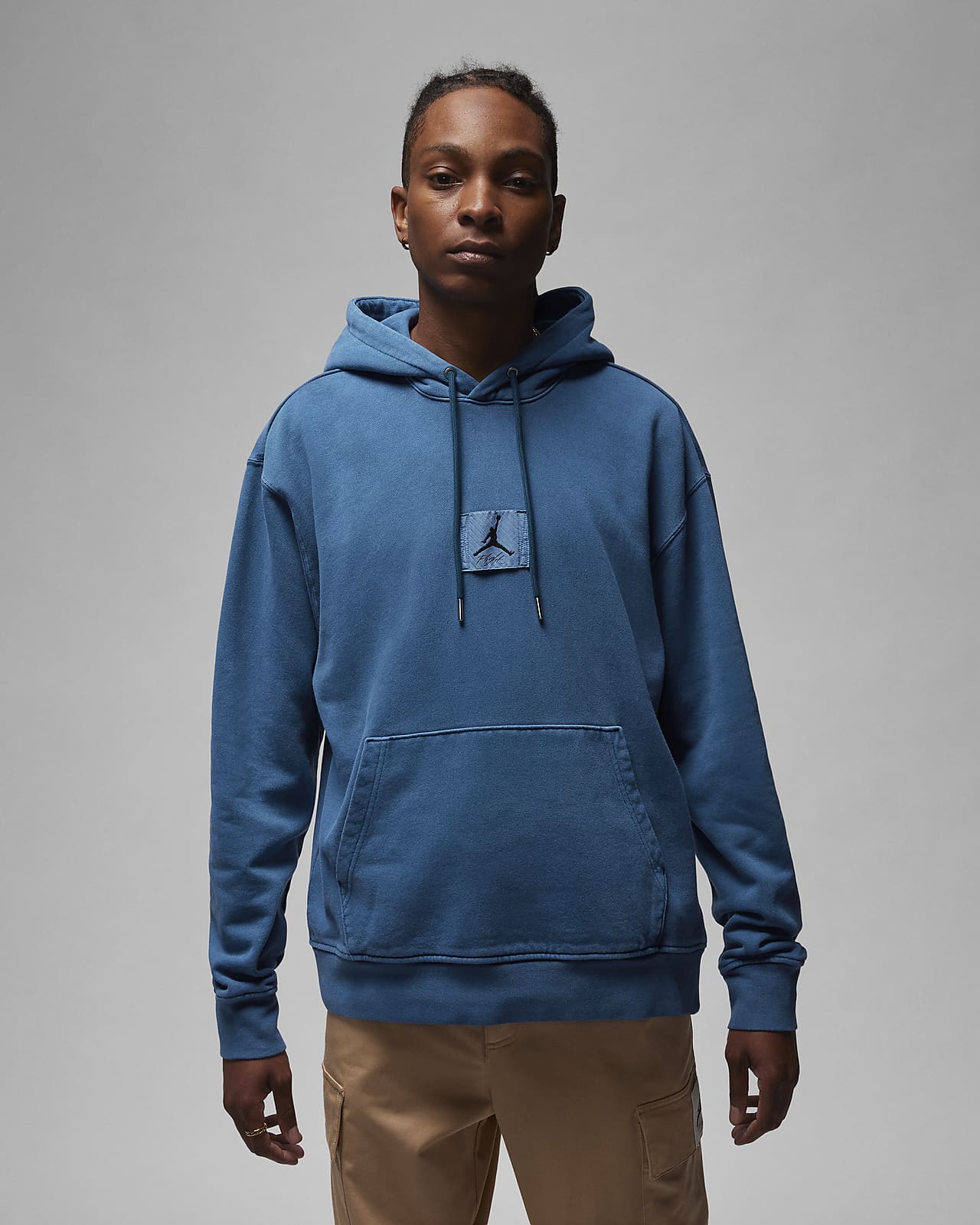 เสื้อมีฮู้ดผ้าฟลีซฟอกสีแบบสวม Statement ผู้ชาย Jordan Essentials
