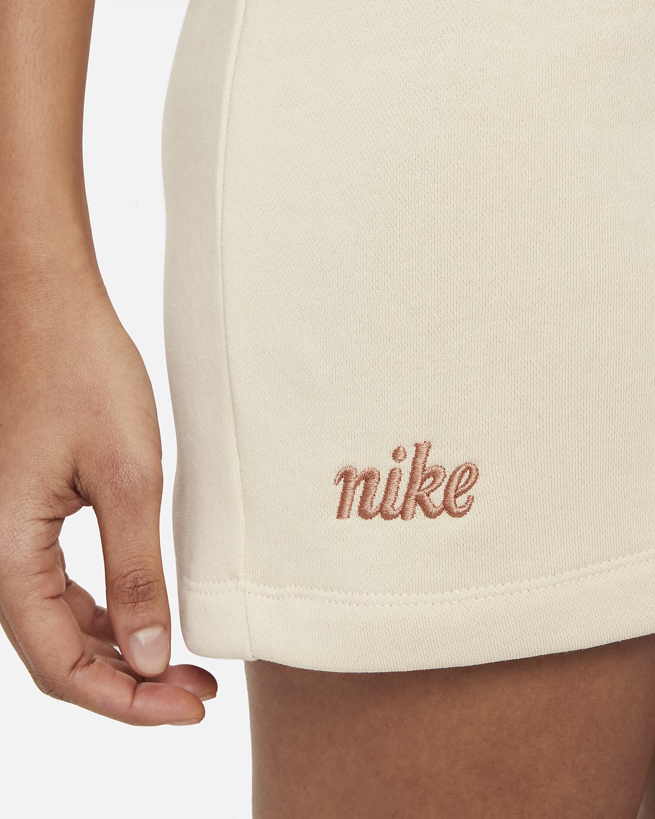 beige nike shorts womens