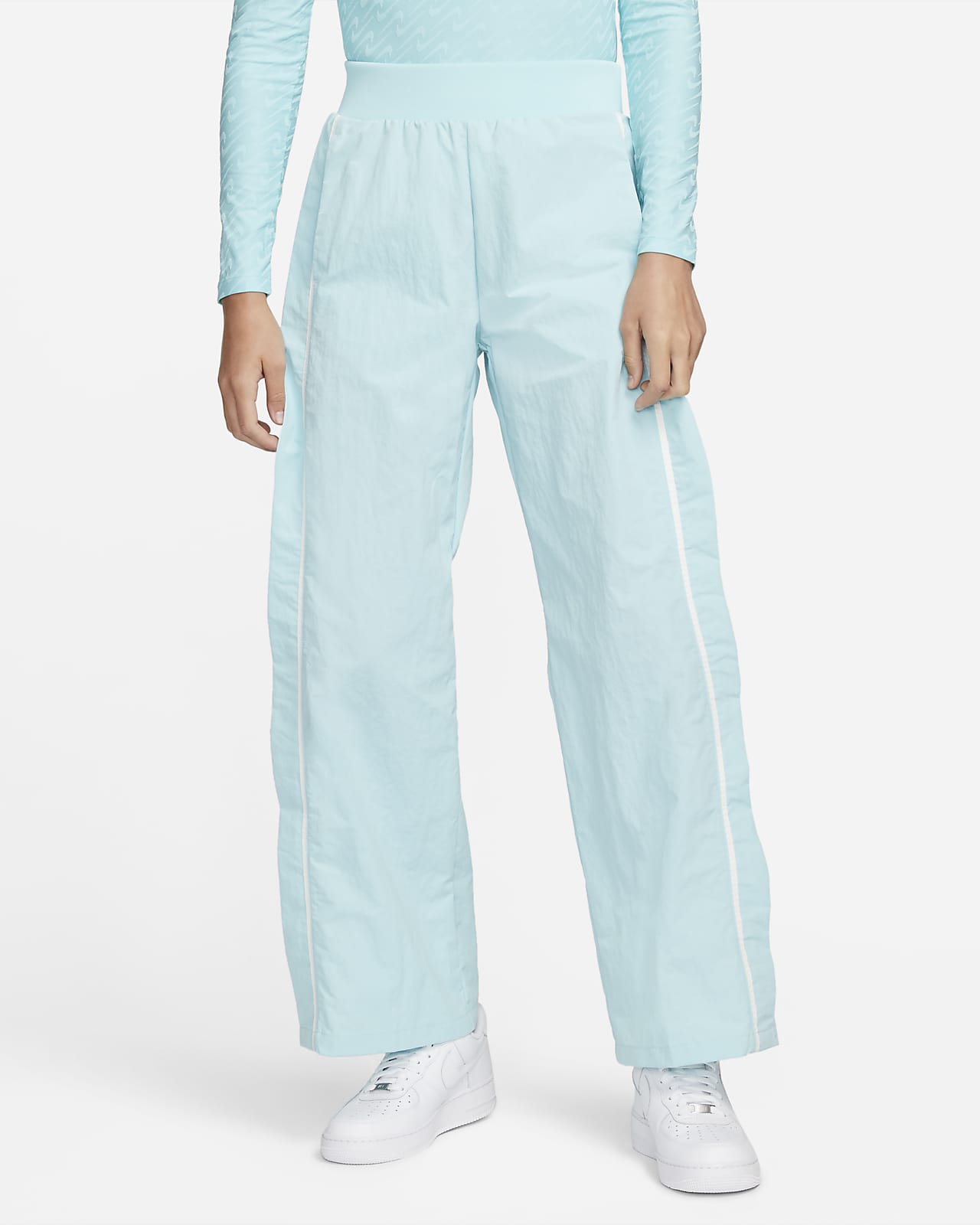 Nike Sportswear Icon Clash Pantalón de pernera ancha de tejido Woven - Mujer.  Nike ES