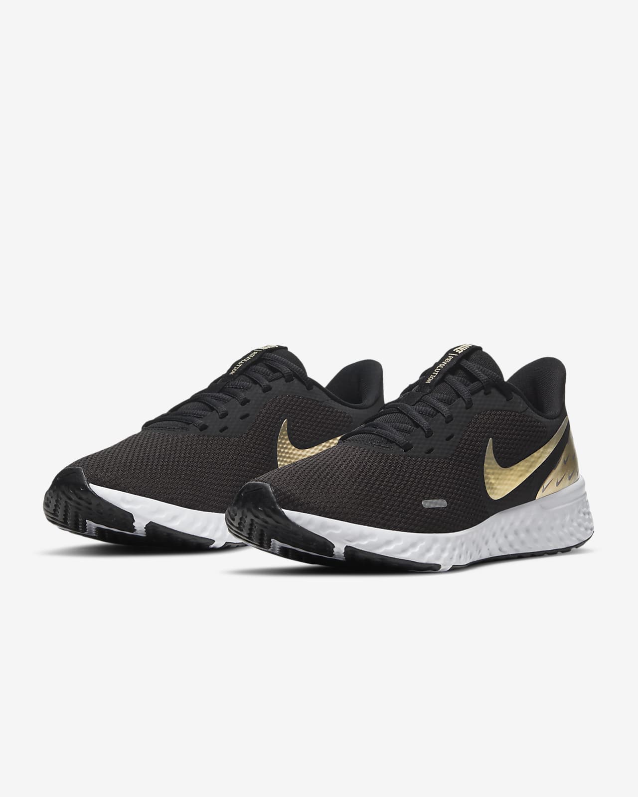 black and gold nike running shoes