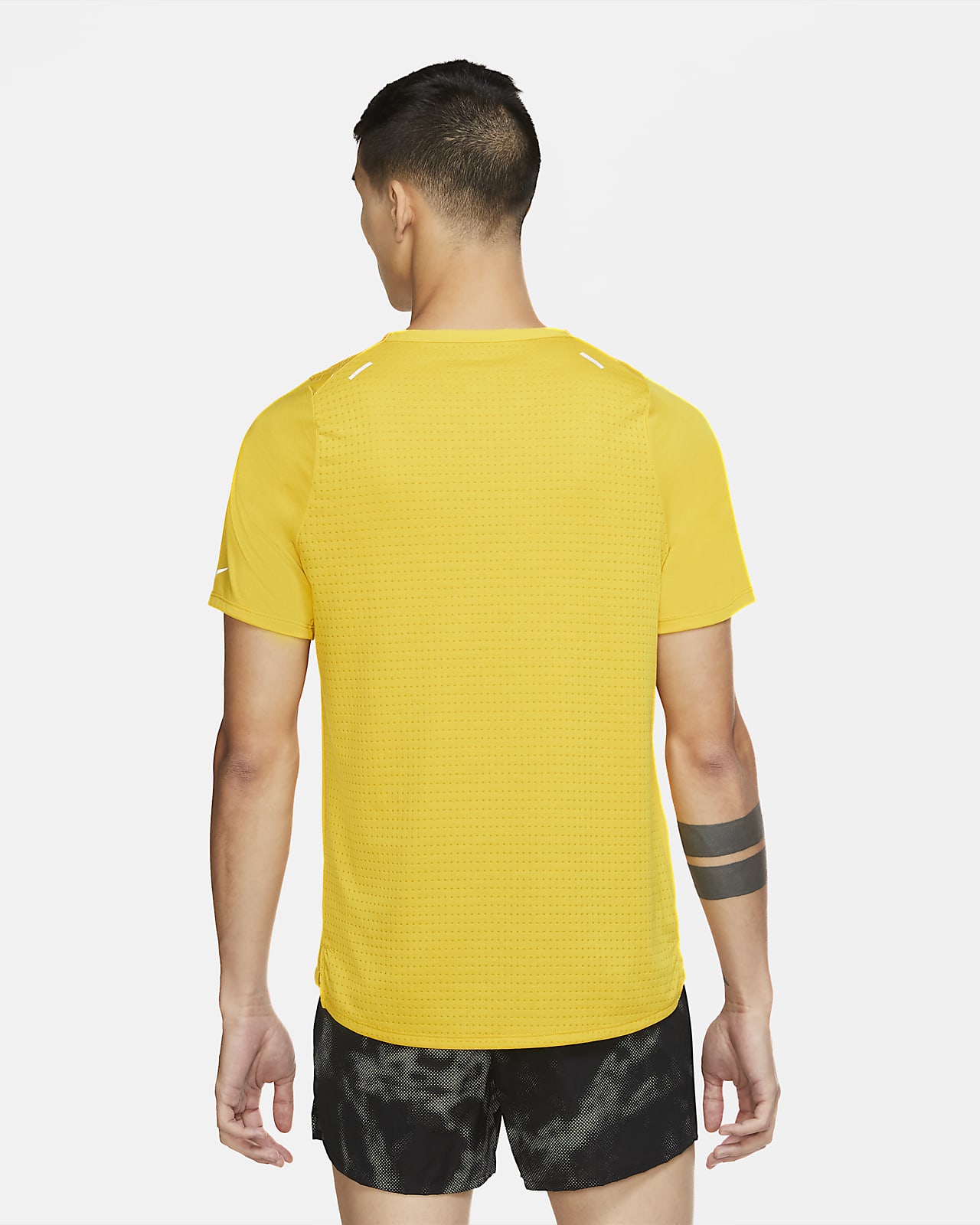 yellow nike running top