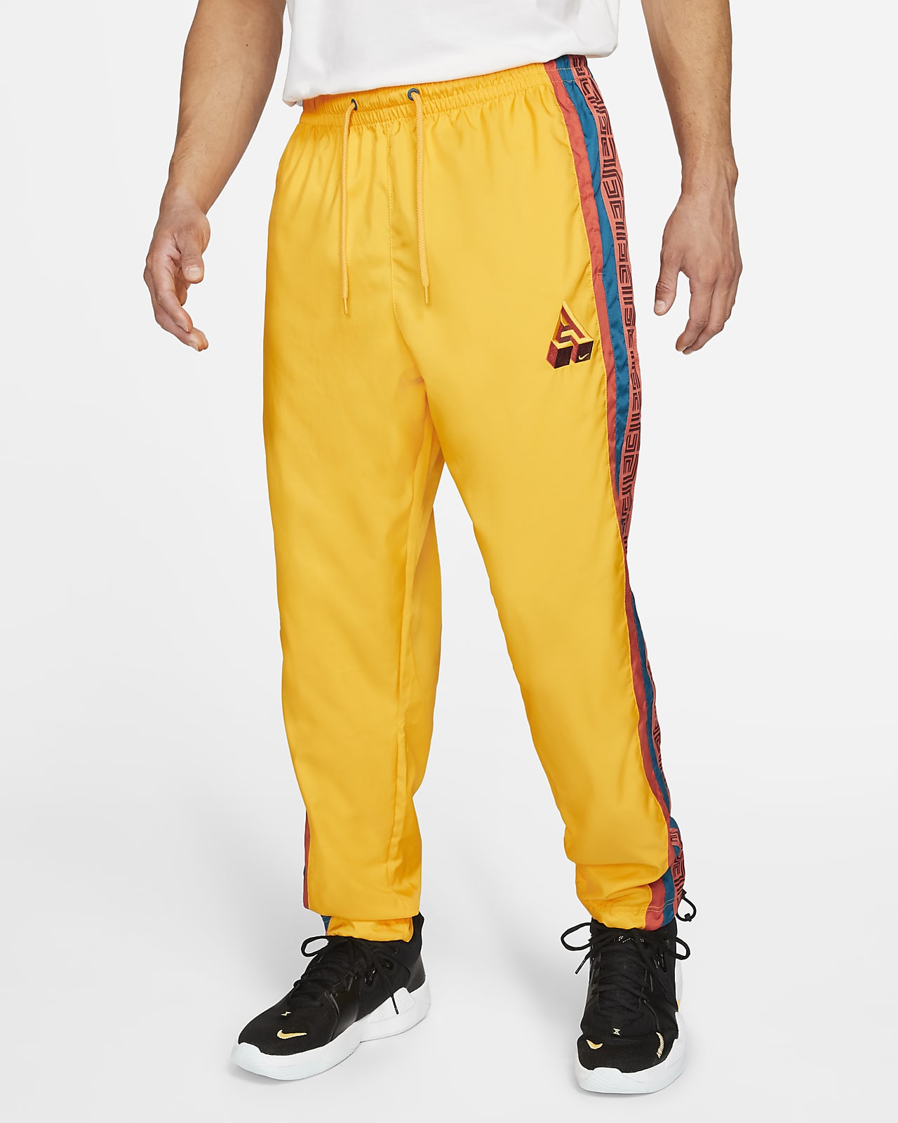 yellow nike track pants