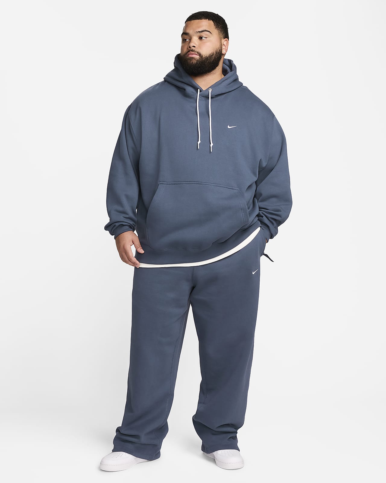 Pants de tejido Fleece con dobladillo abierto para hombre Nike Solo Swoosh