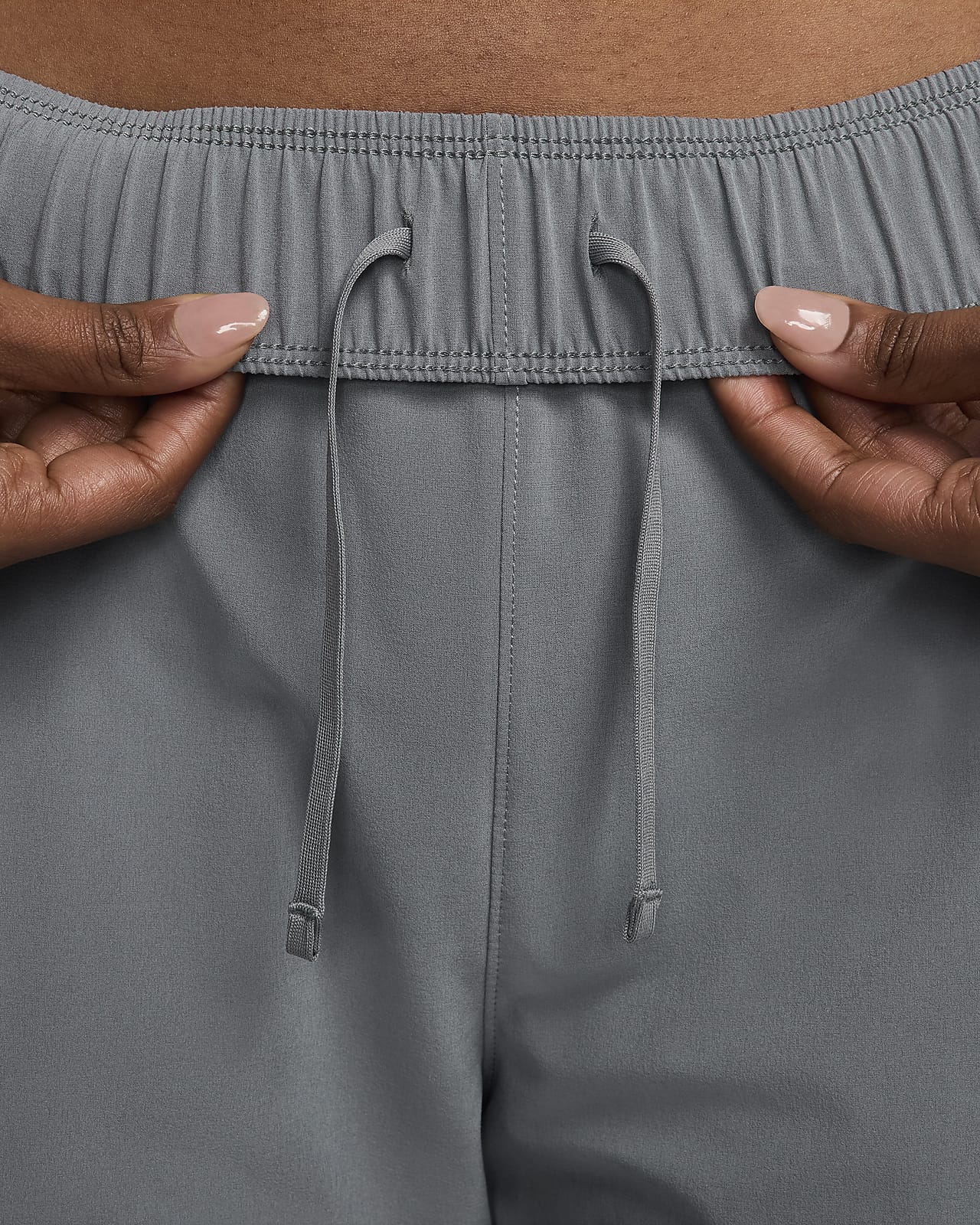 Nike Dri-FIT Swift Women's Mid-Rise Running Trousers. Nike IN