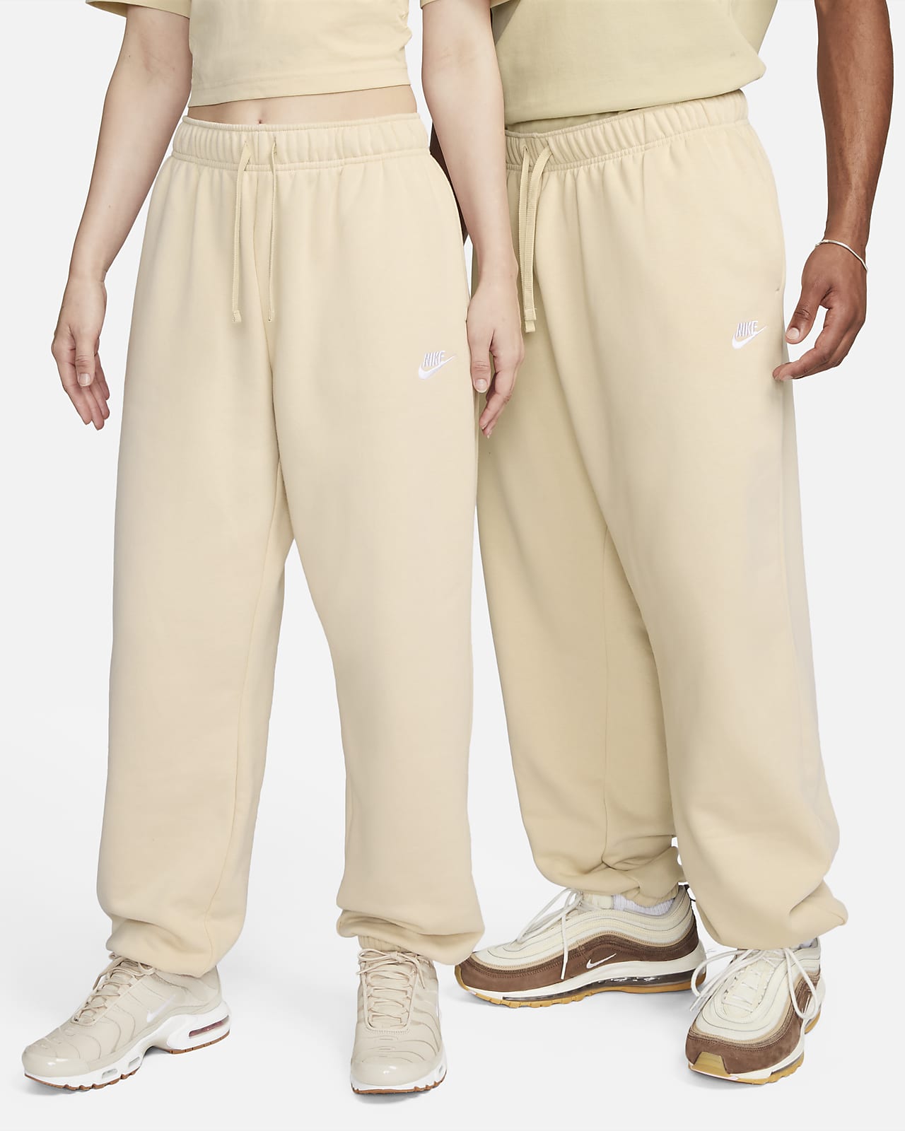 Pants de entrenamiento oversized de tiro medio para mujer Nike Sportswear Club Fleece