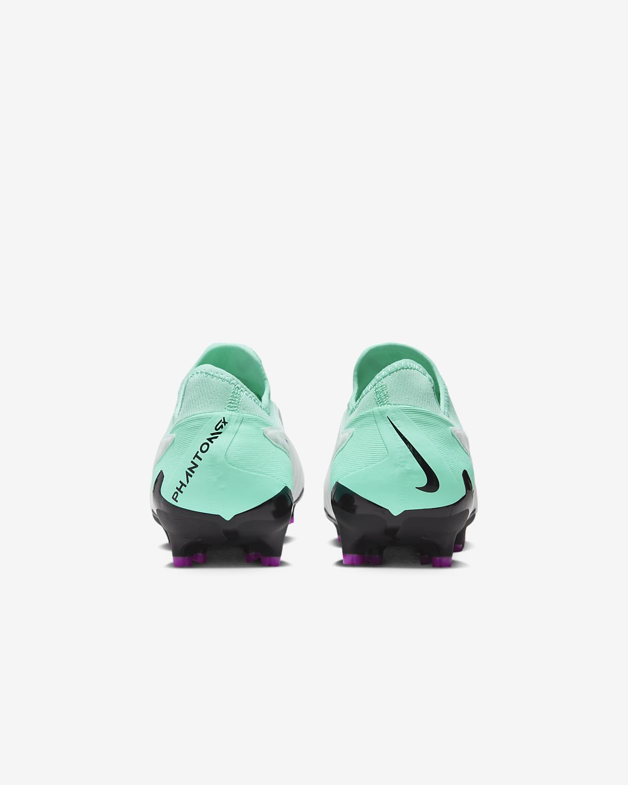 Nike Phantom GX Pro Firm Ground Low Top Soccer Cleats. Nike