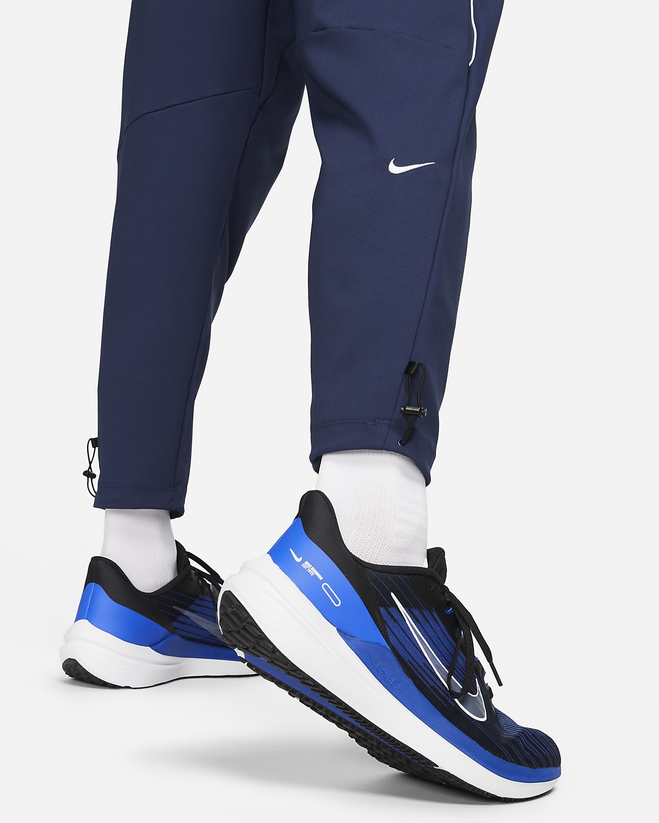 Nike Challenger Track Club Men's Dri-FIT Running Trousers. Nike IE