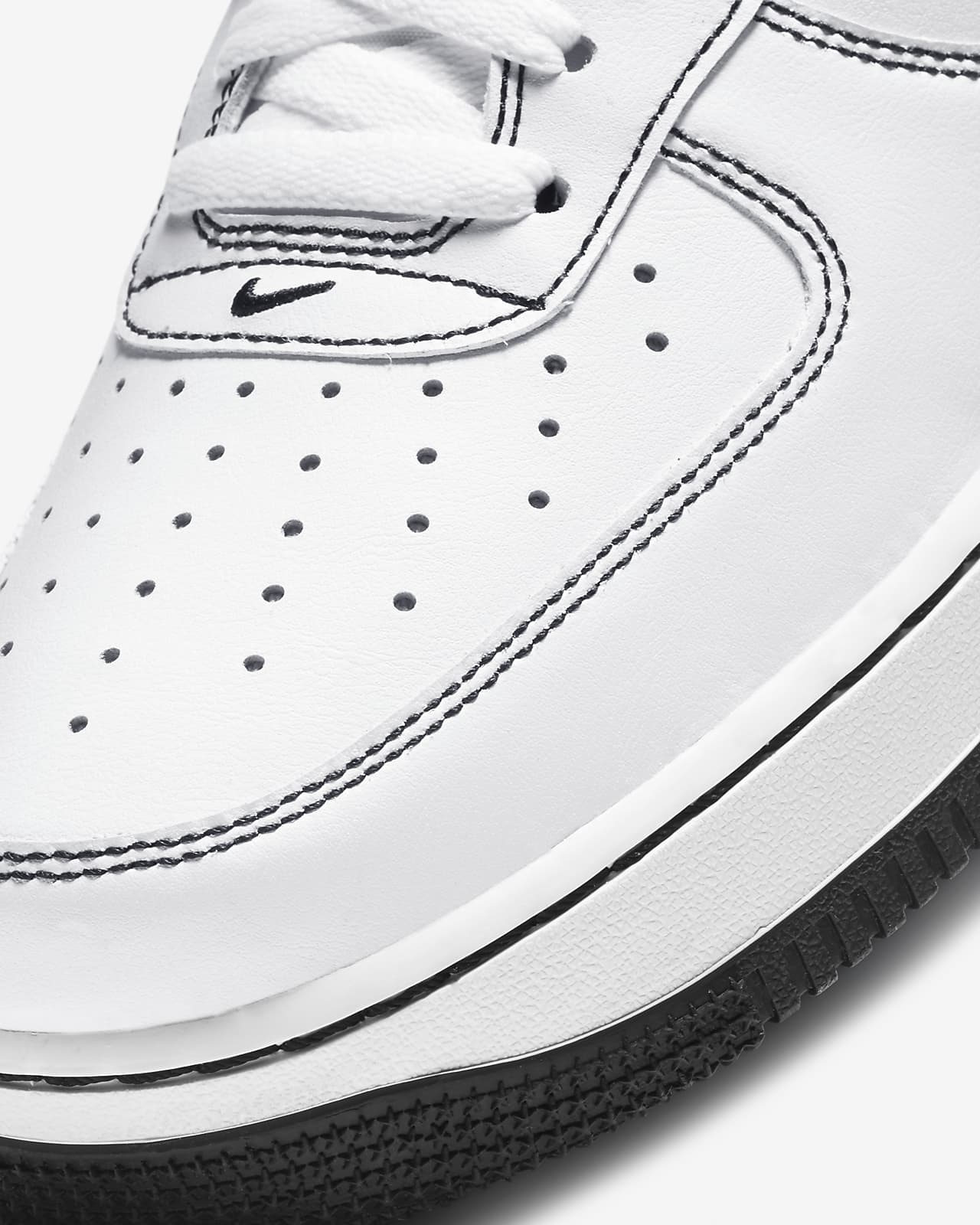 white nike air force with black tick