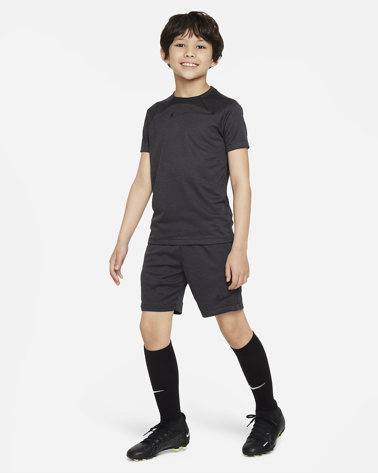 Kids black best sale nike shorts