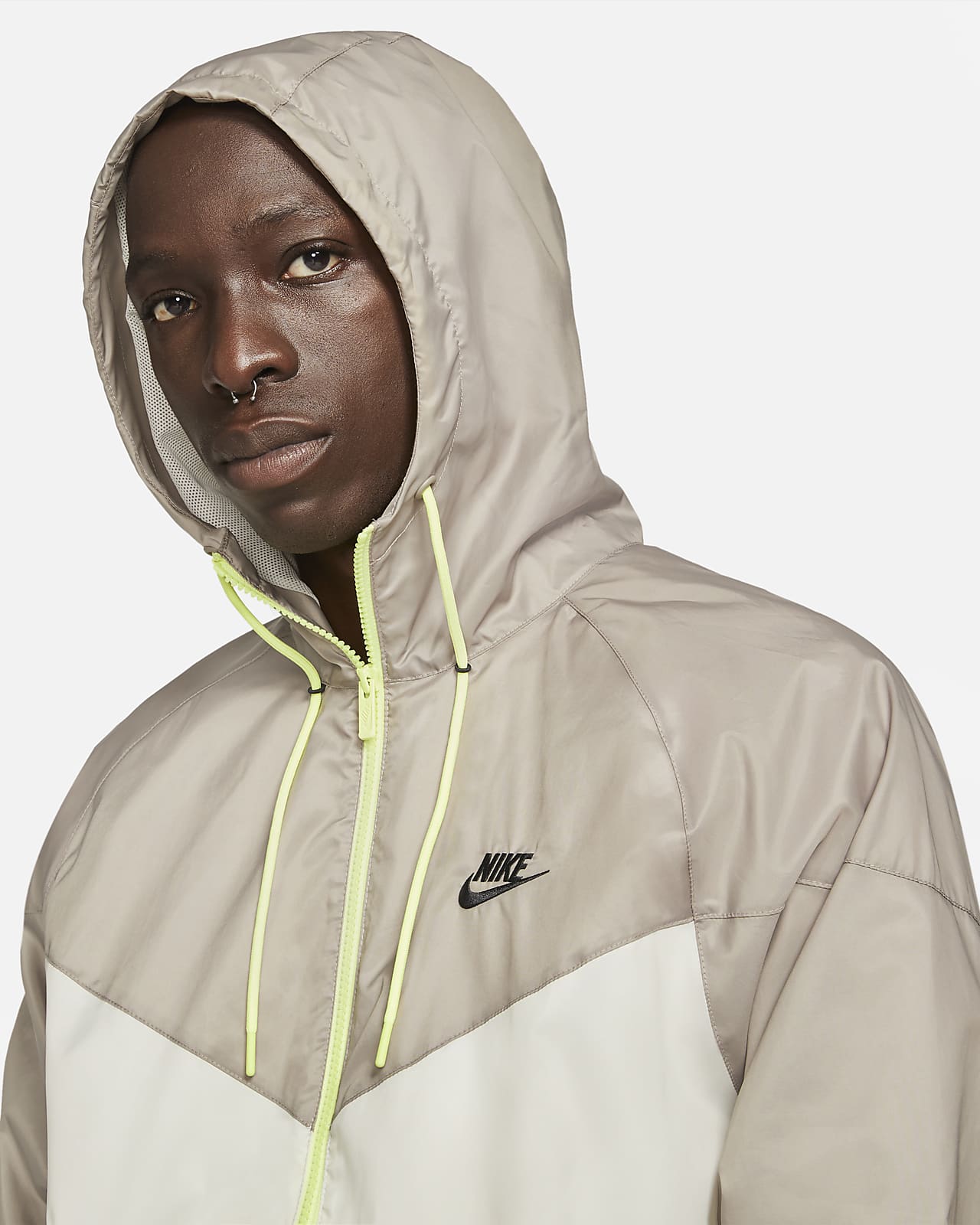 tan and white nike windbreaker