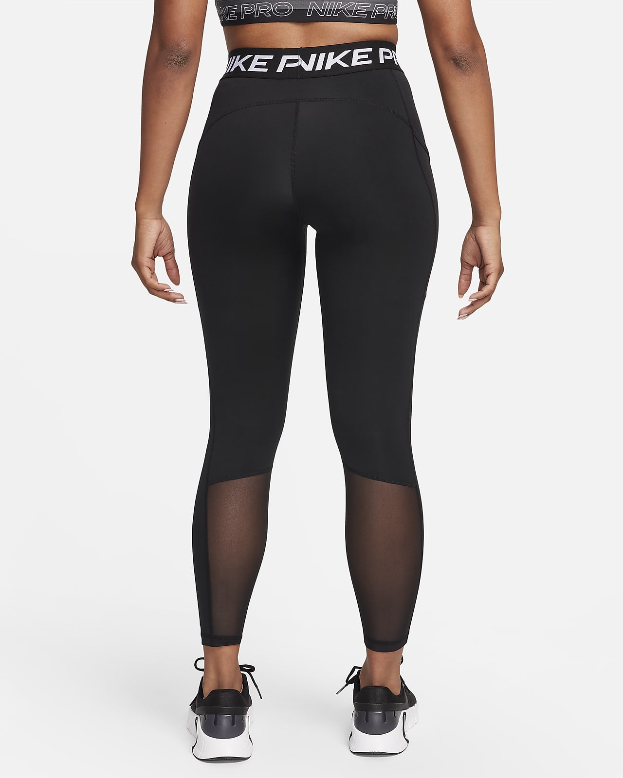 Pro 7/8-leggings med mellemhøj og lommer til kvinder. Nike DK