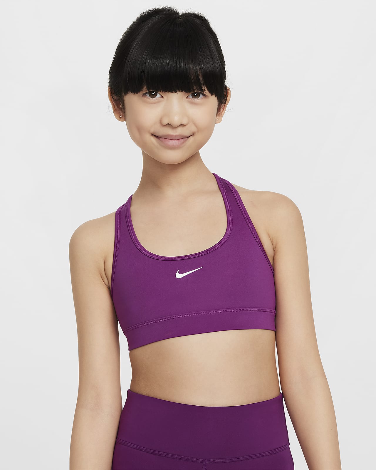 Sportovní podprsenka Nike Swoosh pro větší děti (dívky)