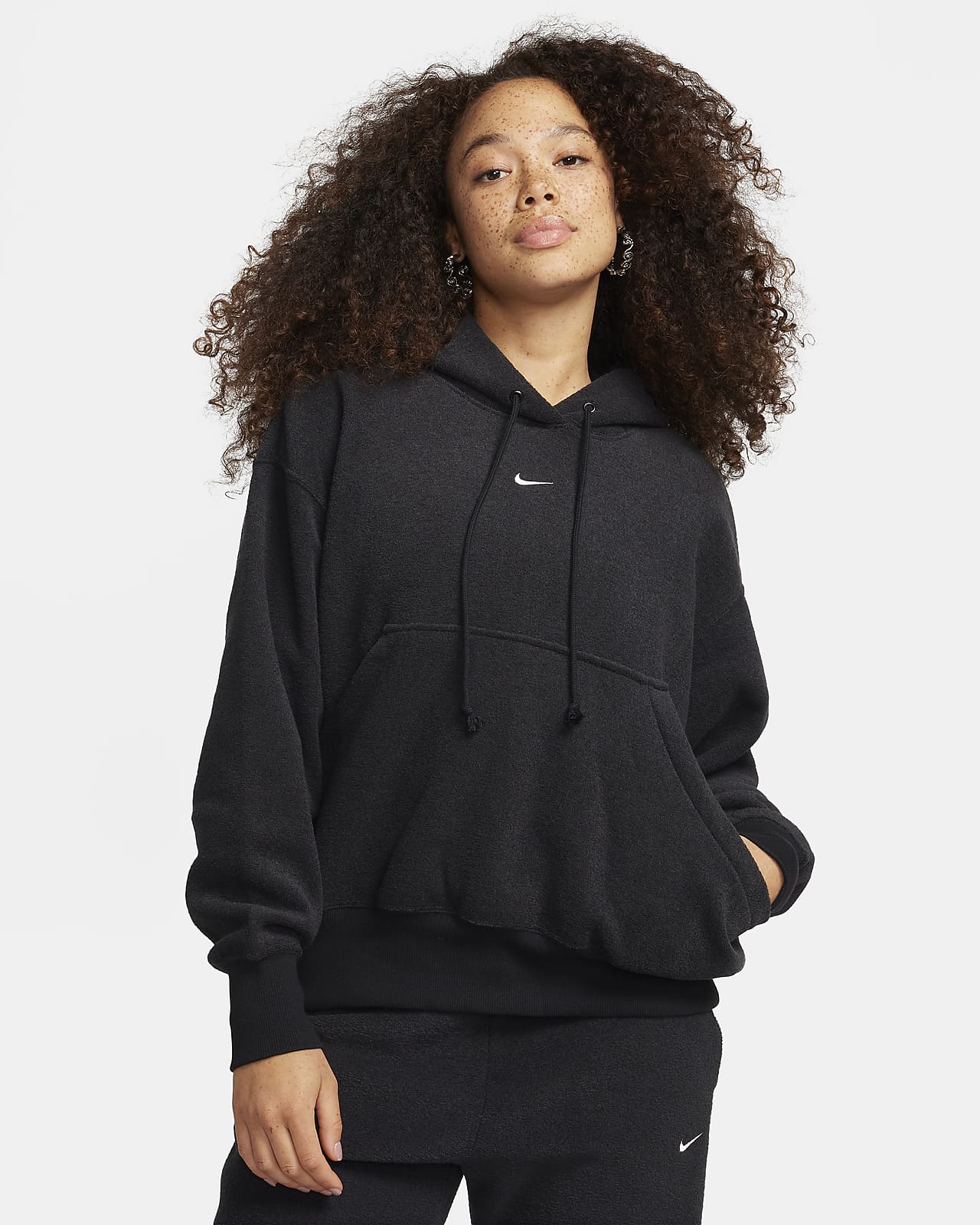 Γυναικεία άνετη μπλούζα με κουκούλα από φλις ύφασμα σε φαρδιά γραμμή Nike Sportswear Phoenix Plush