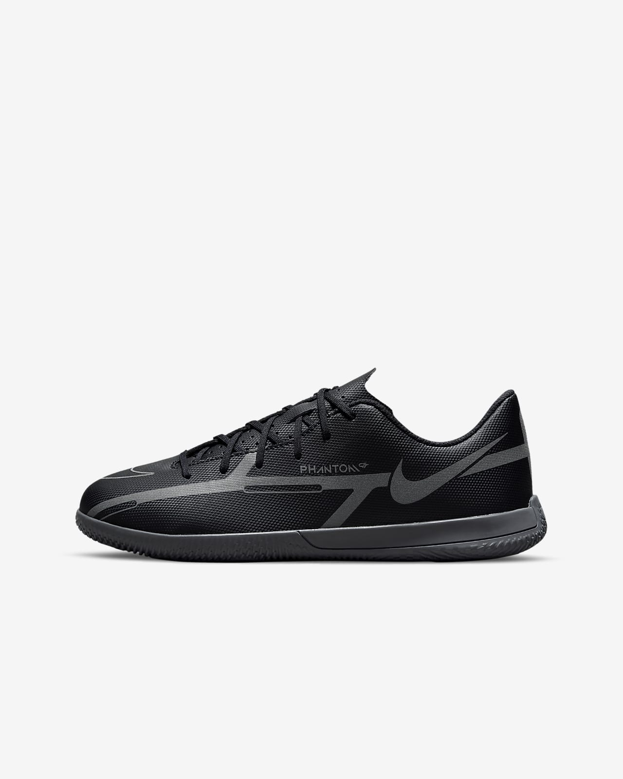 Calzado de fútbol para canchas de pasto y cubierta para niños talla pequeña/grande  Nike Jr. Phantom GT2 Club IC. Nike.com