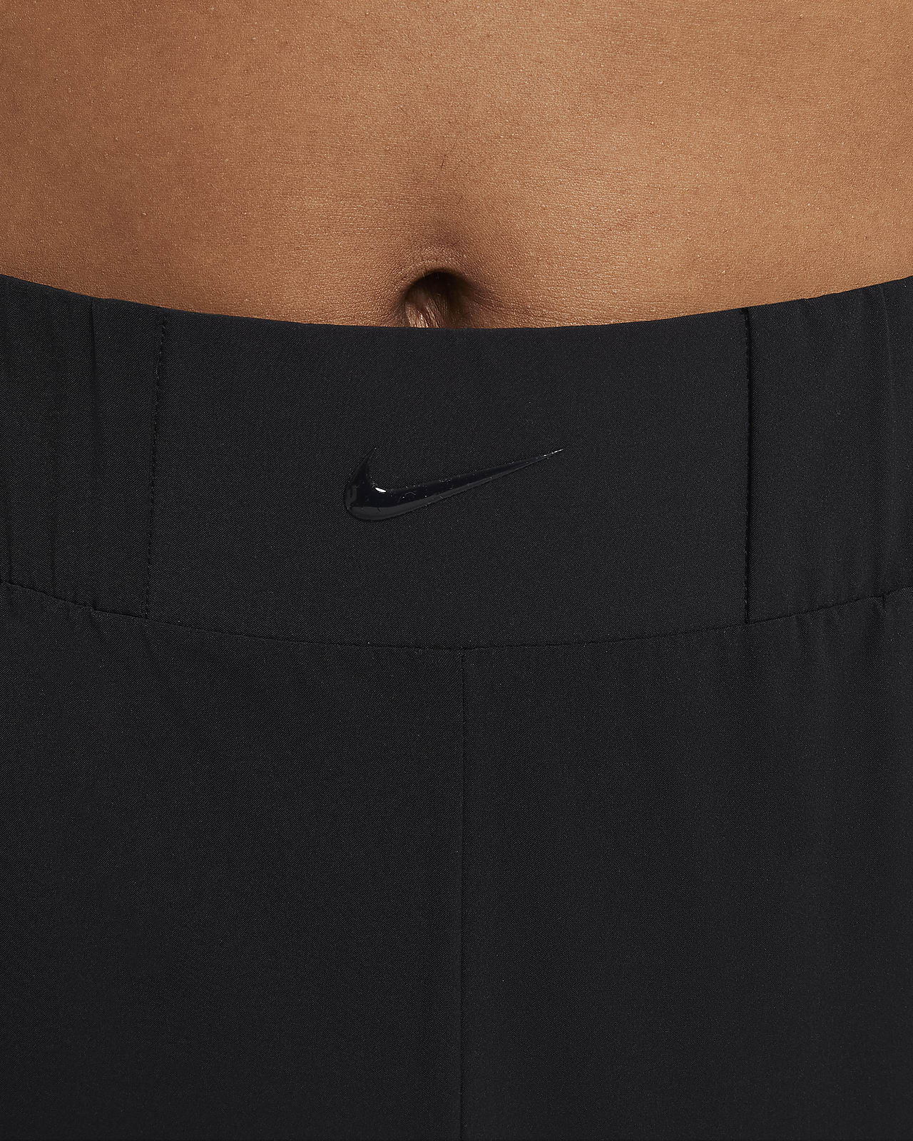 Pantaloni da training in tessuto Nike Bliss Luxe Donna. Nike IT