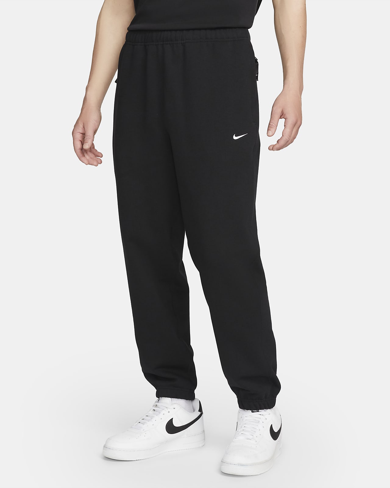 Nike Solo Swoosh Men's French Terry Trousers. Nike VN