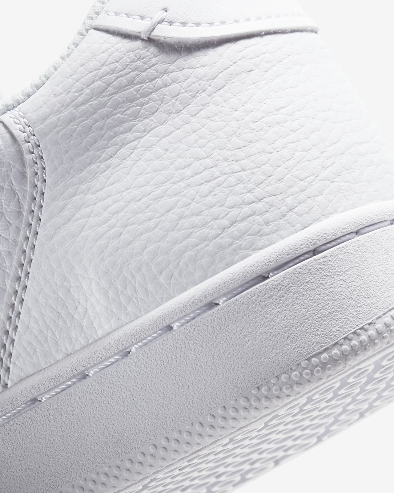nike court vintage premium leather sneakers in white