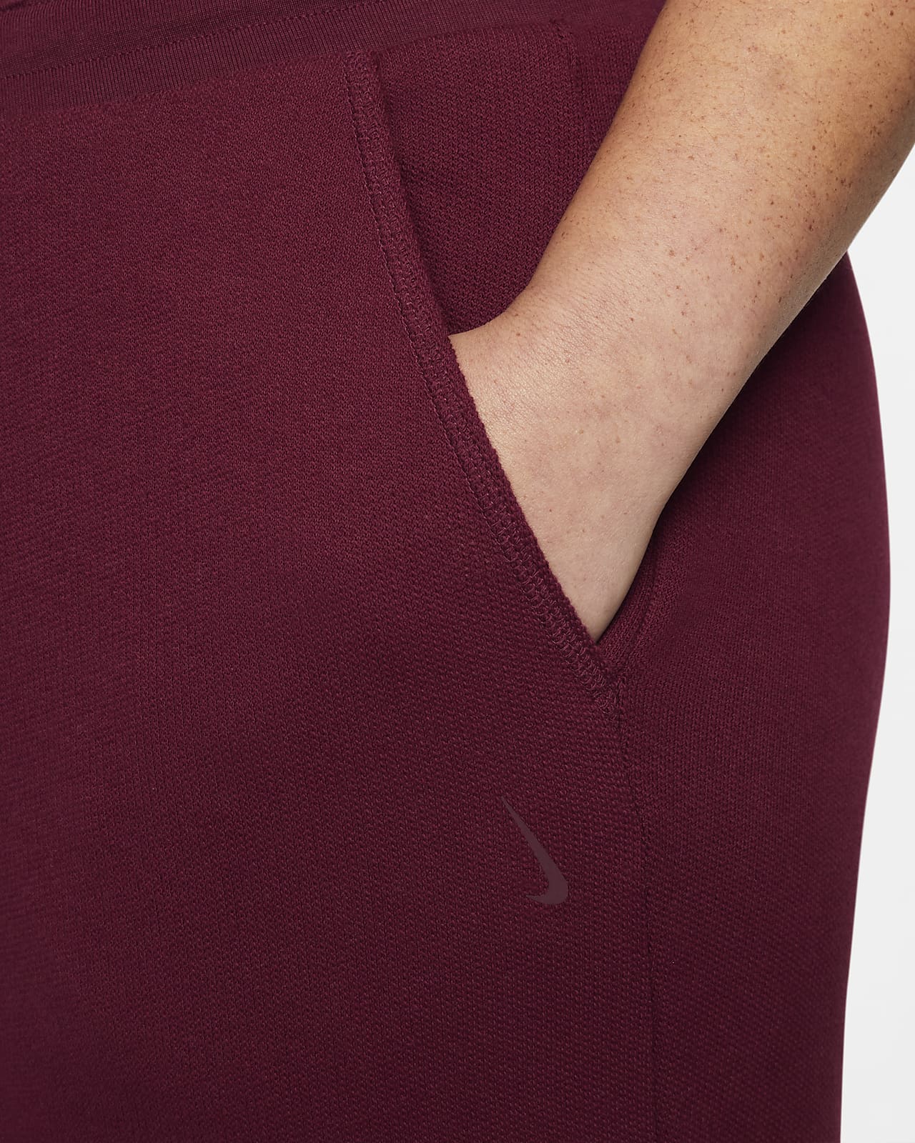 Joggers de tejido Fleece de tiro alto para mujer Nike Yoga Therma-FIT  (Talla grande). Nike.com