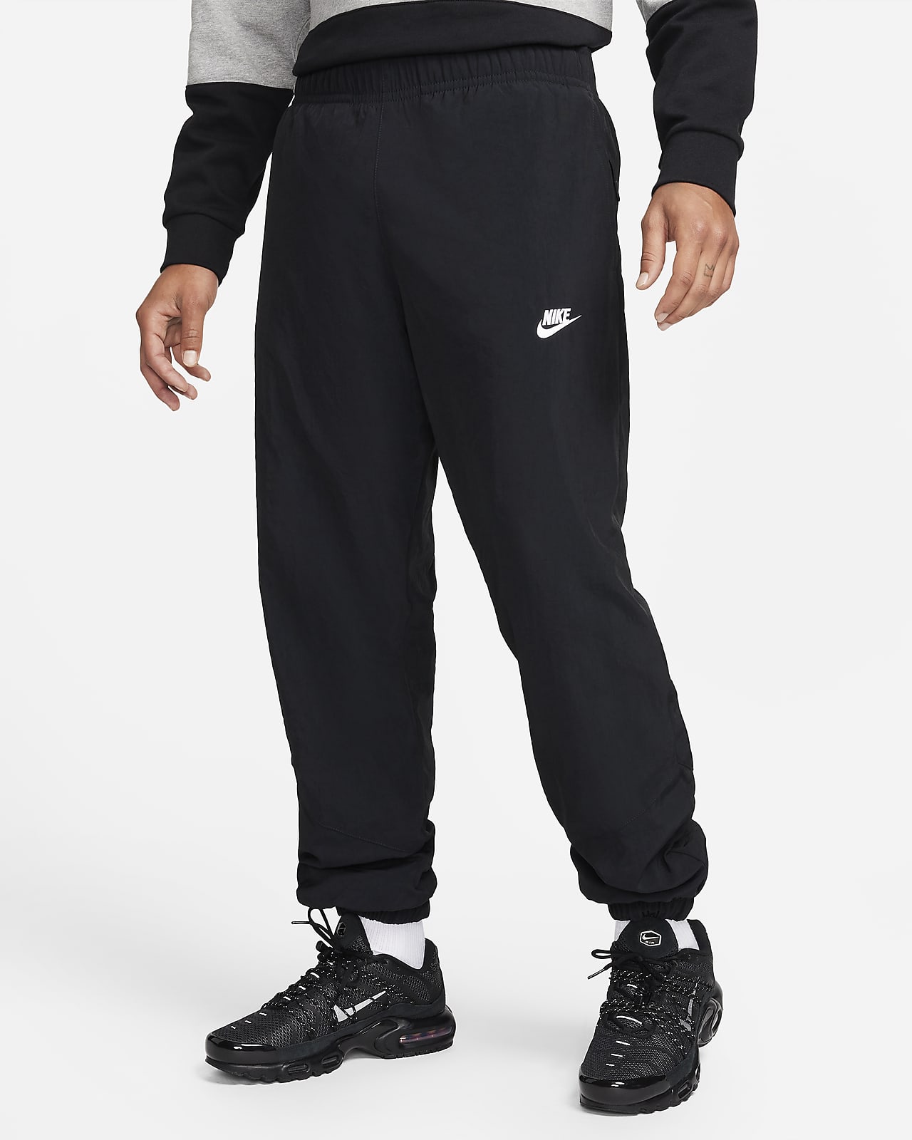 Pantaloni in tessuto per l'inverno Nike Windrunner – Uomo