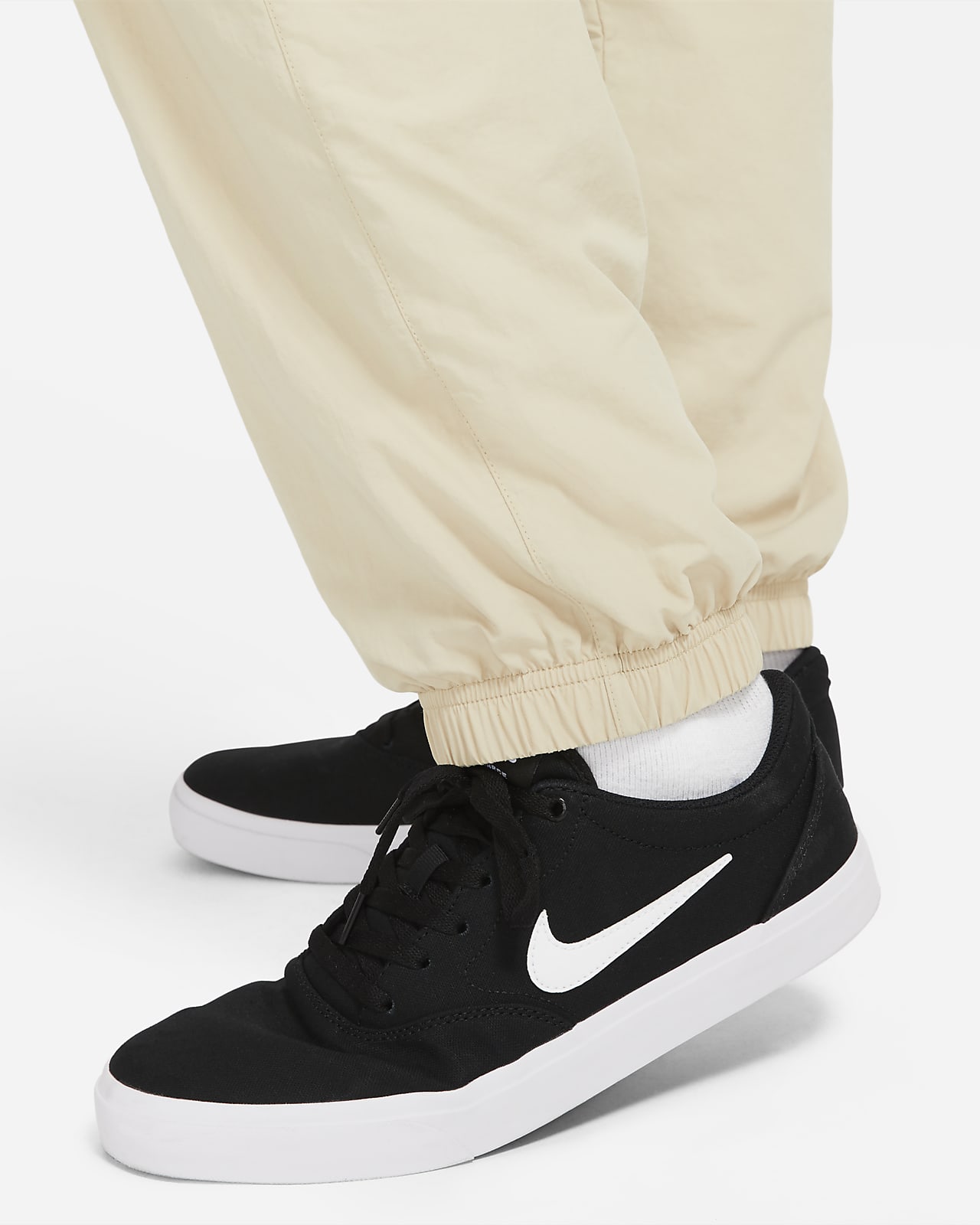 nike tracksuit bottoms with zips