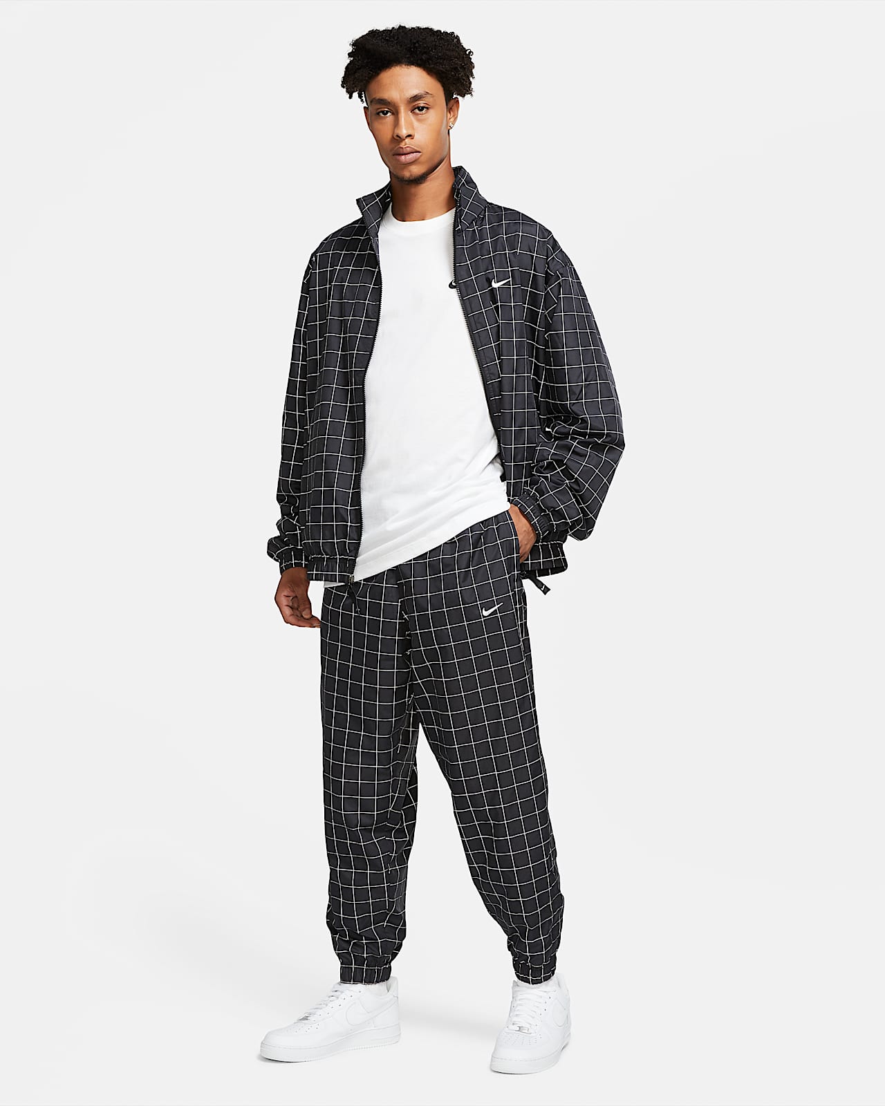 nike woven plaid track pants