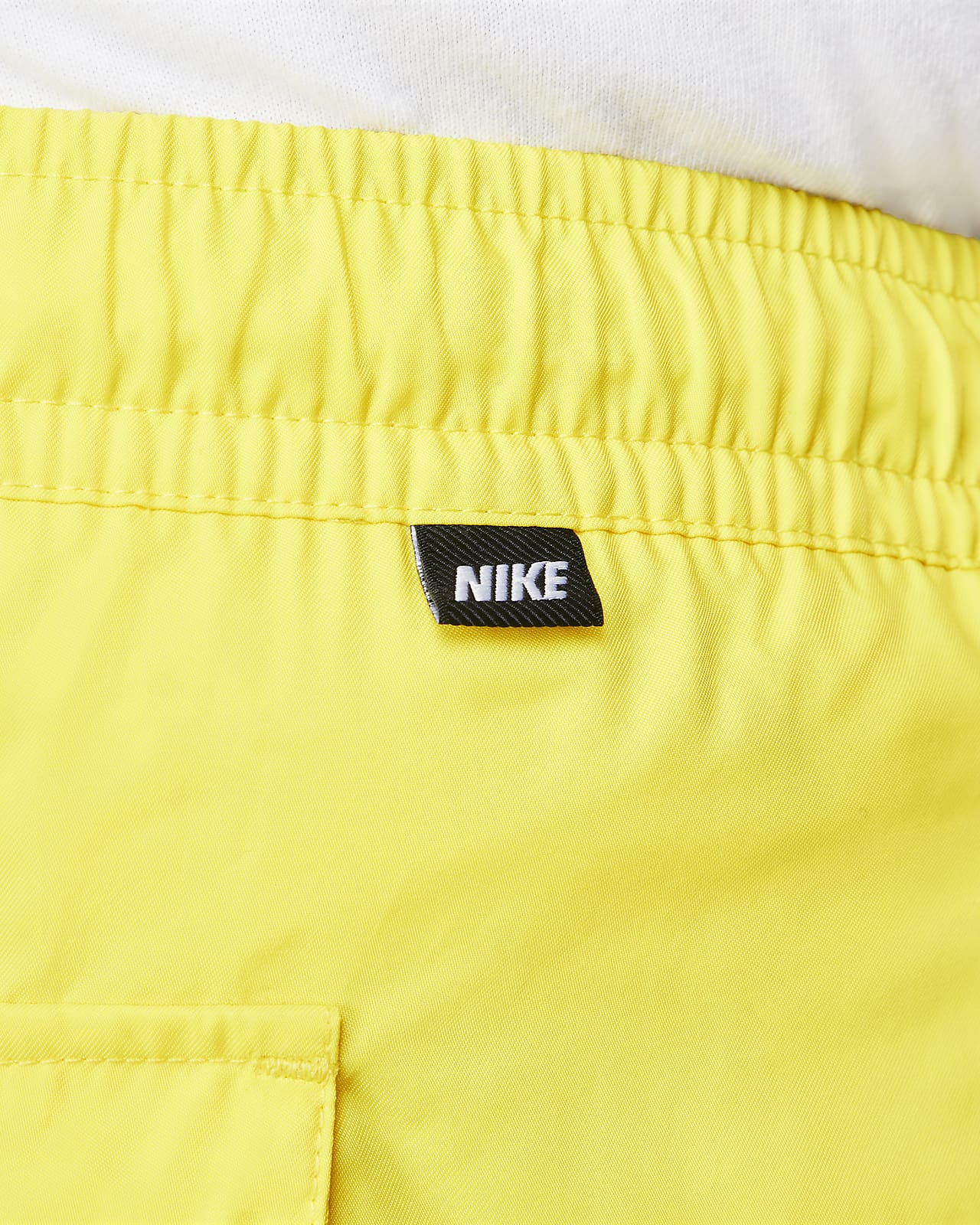 Nike club essentials woven flow shorts yellow 2025