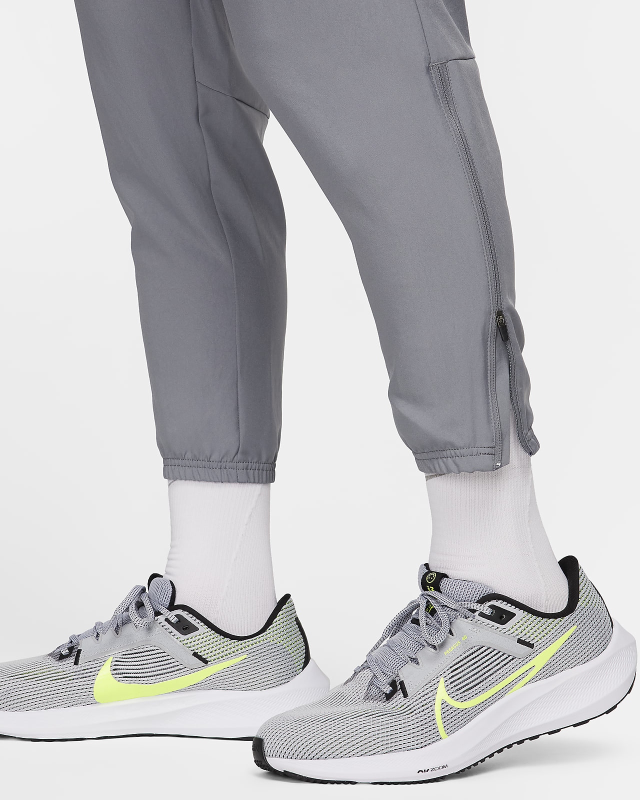 Nike Men Dri-Fit Challenger Woven Pants in Smoke Grey,Different