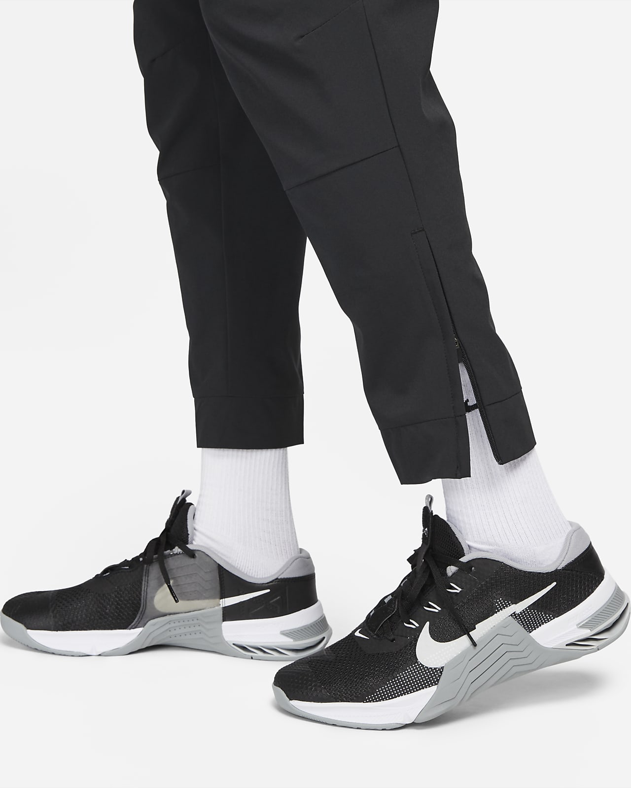 schedel Terminal Zin Nike Unlimited Men's Dri-FIT Tapered-Leg Versatile Trousers. Nike SI