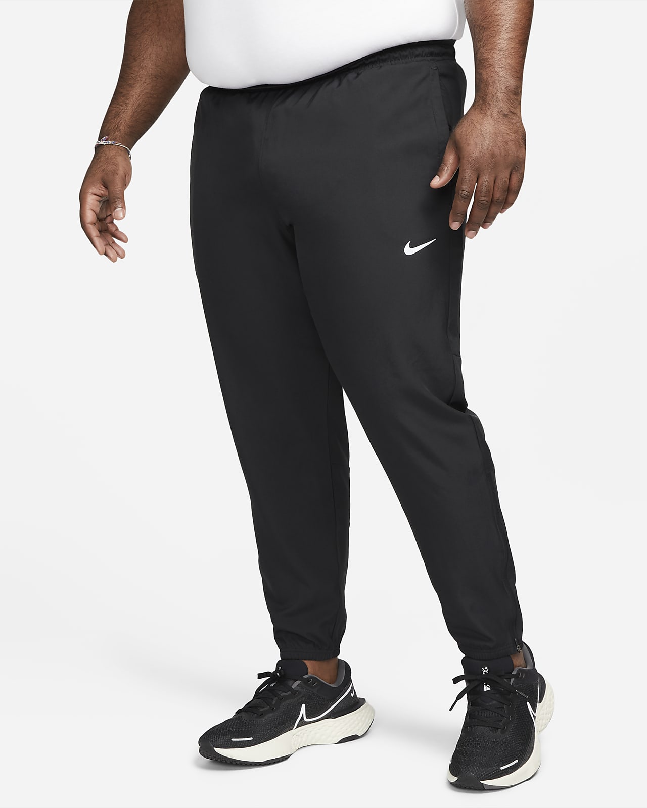 Nike Dri-FIT Men's Woven Team Training Trousers. Nike LU